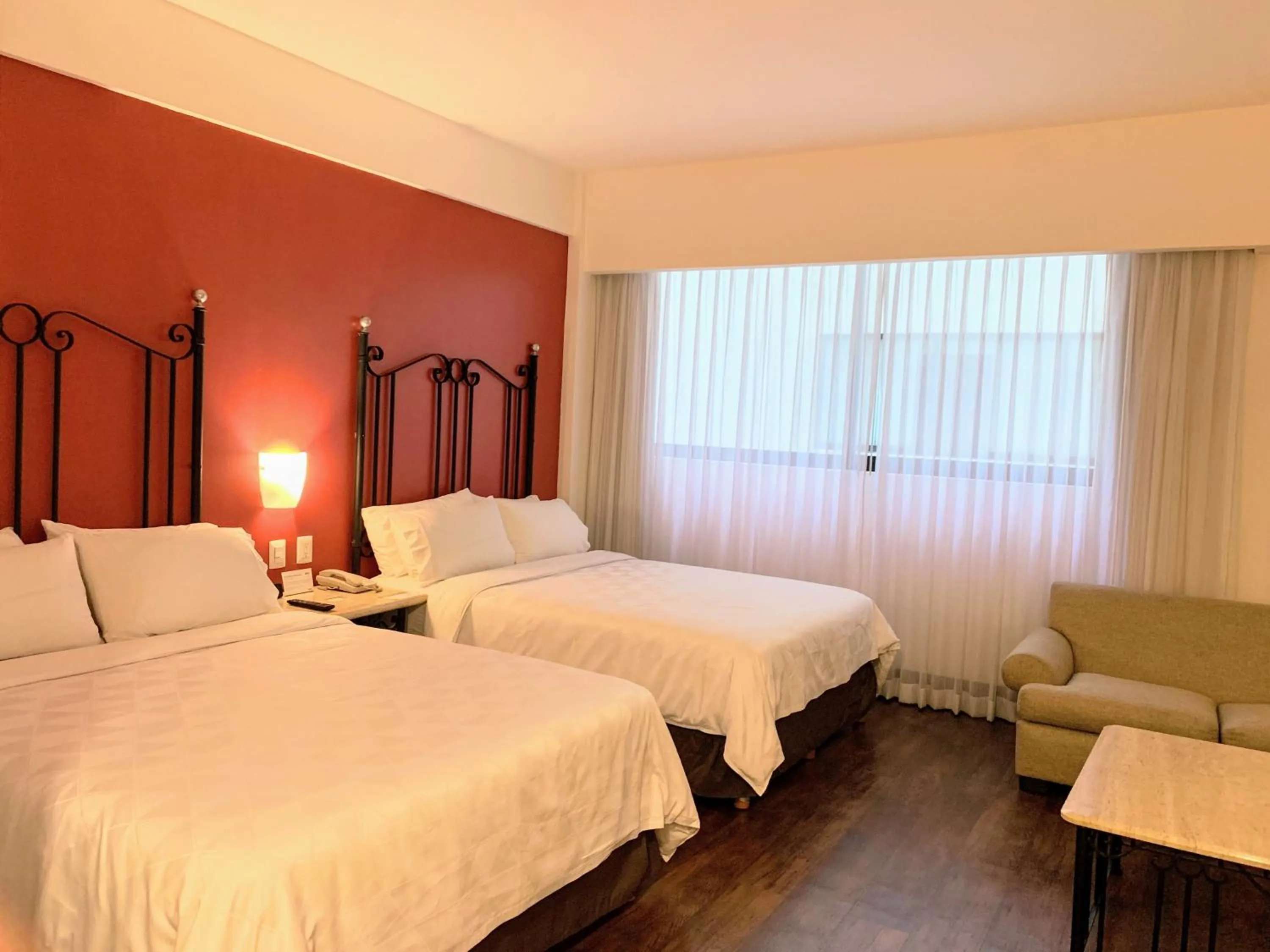 Photo of the whole room, Bed in Holiday Inn Hotel & Suites Centro Historico by IHG