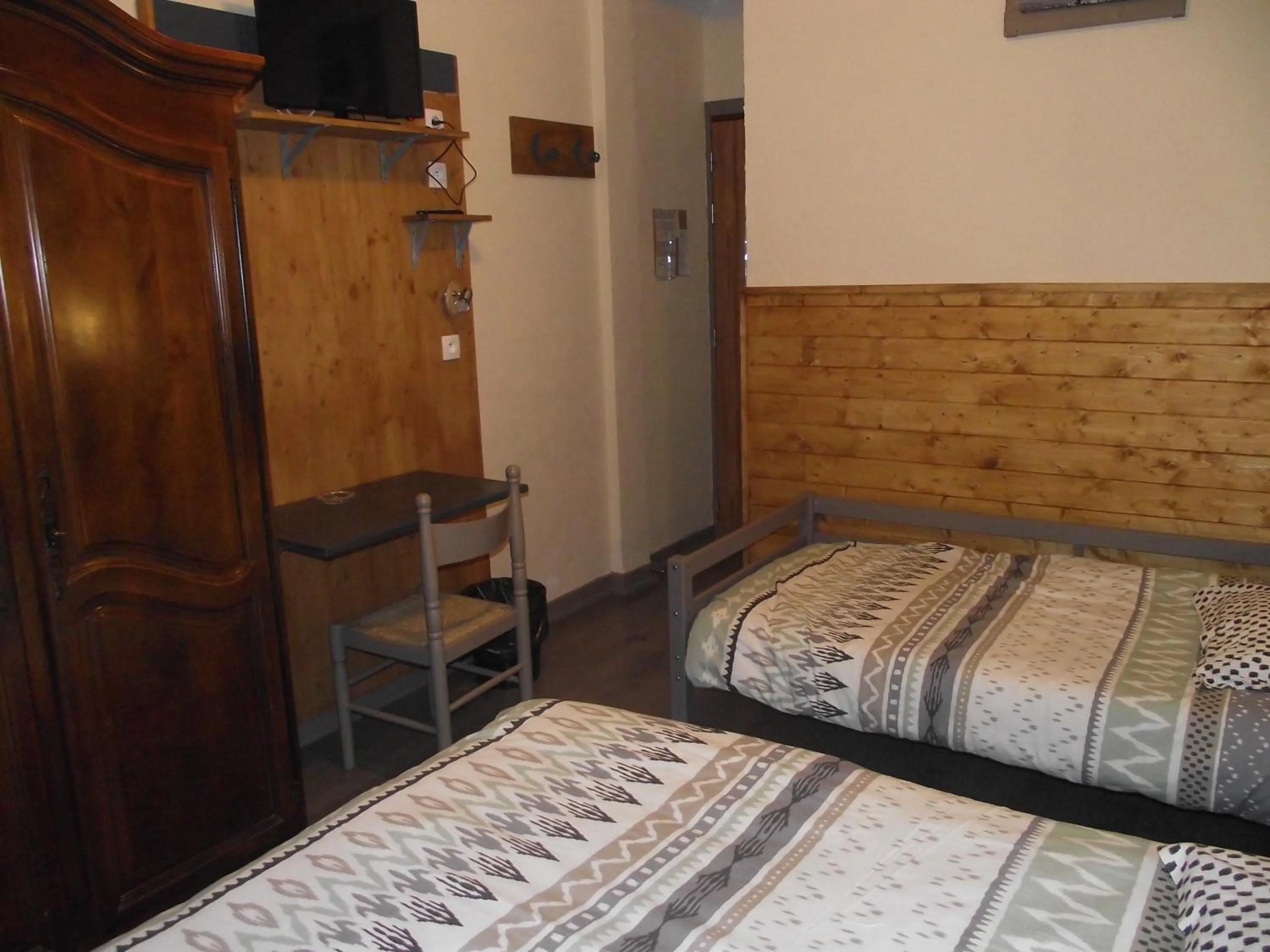 Bed in Hotel Valérie