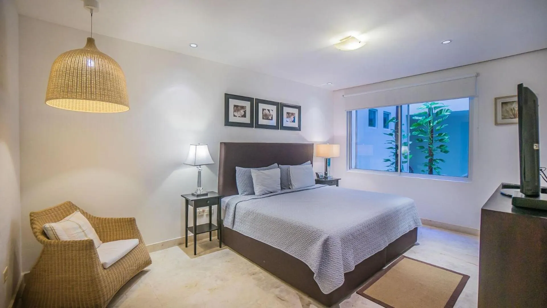 Bed in The Elements Oceanfront & Beachside Condo Hotel