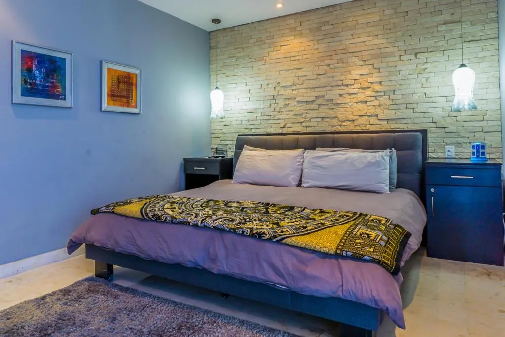 Bedroom, Bed in The Elements Oceanfront & Beachside Condo Hotel