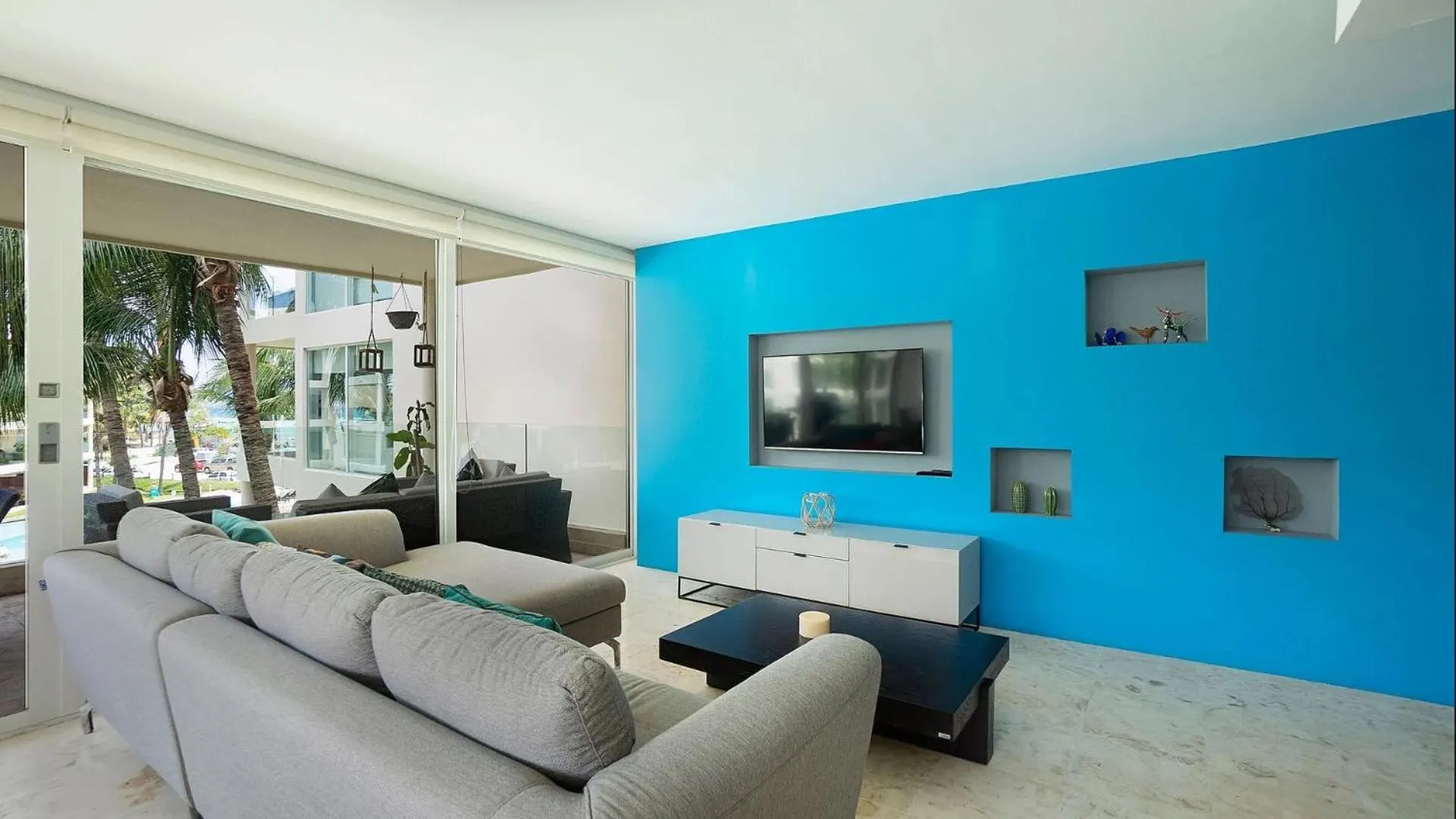 Living room in The Elements Oceanfront & Beachside Condo Hotel