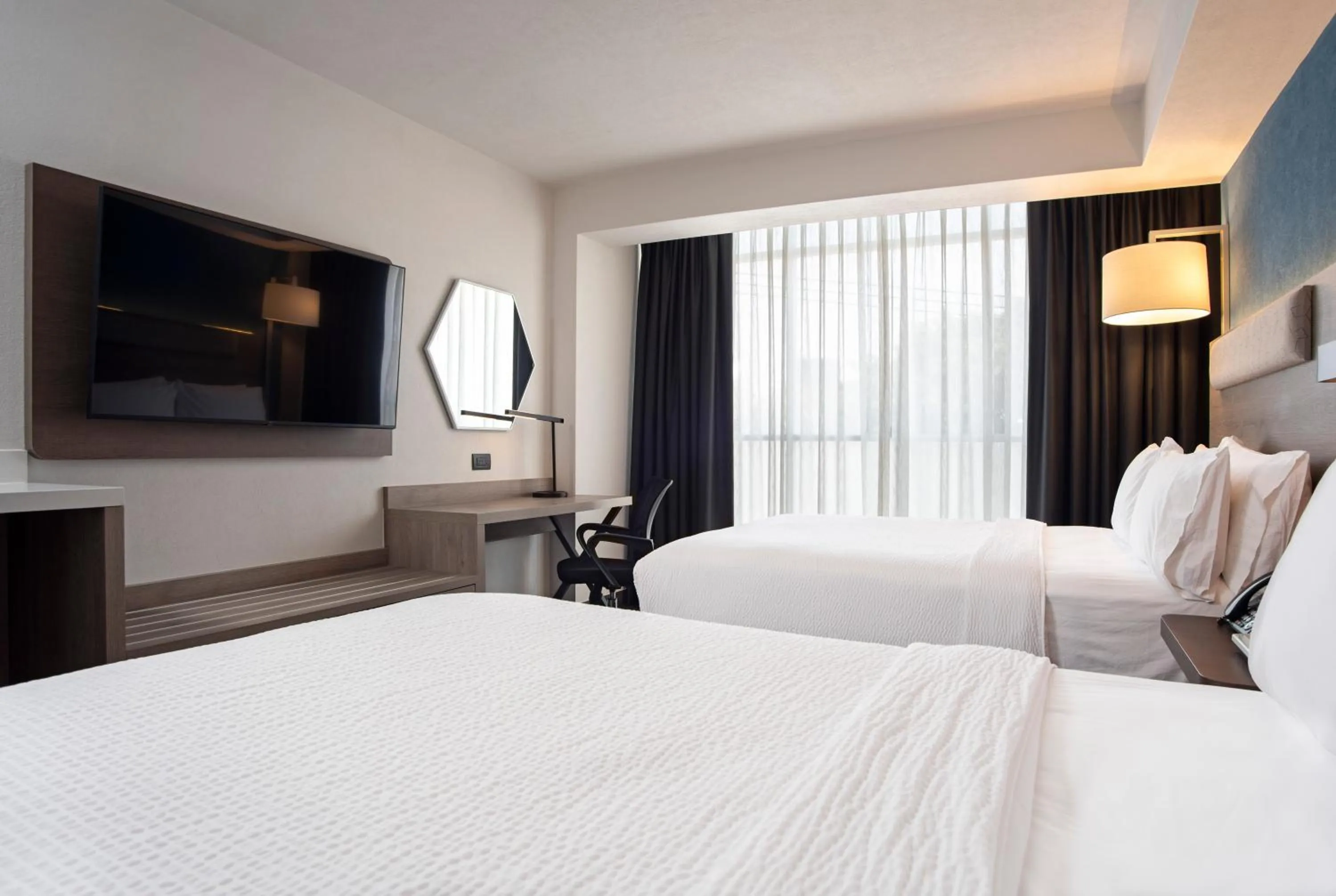 Bed in Holiday Inn Express Guadalajara Expo by IHG