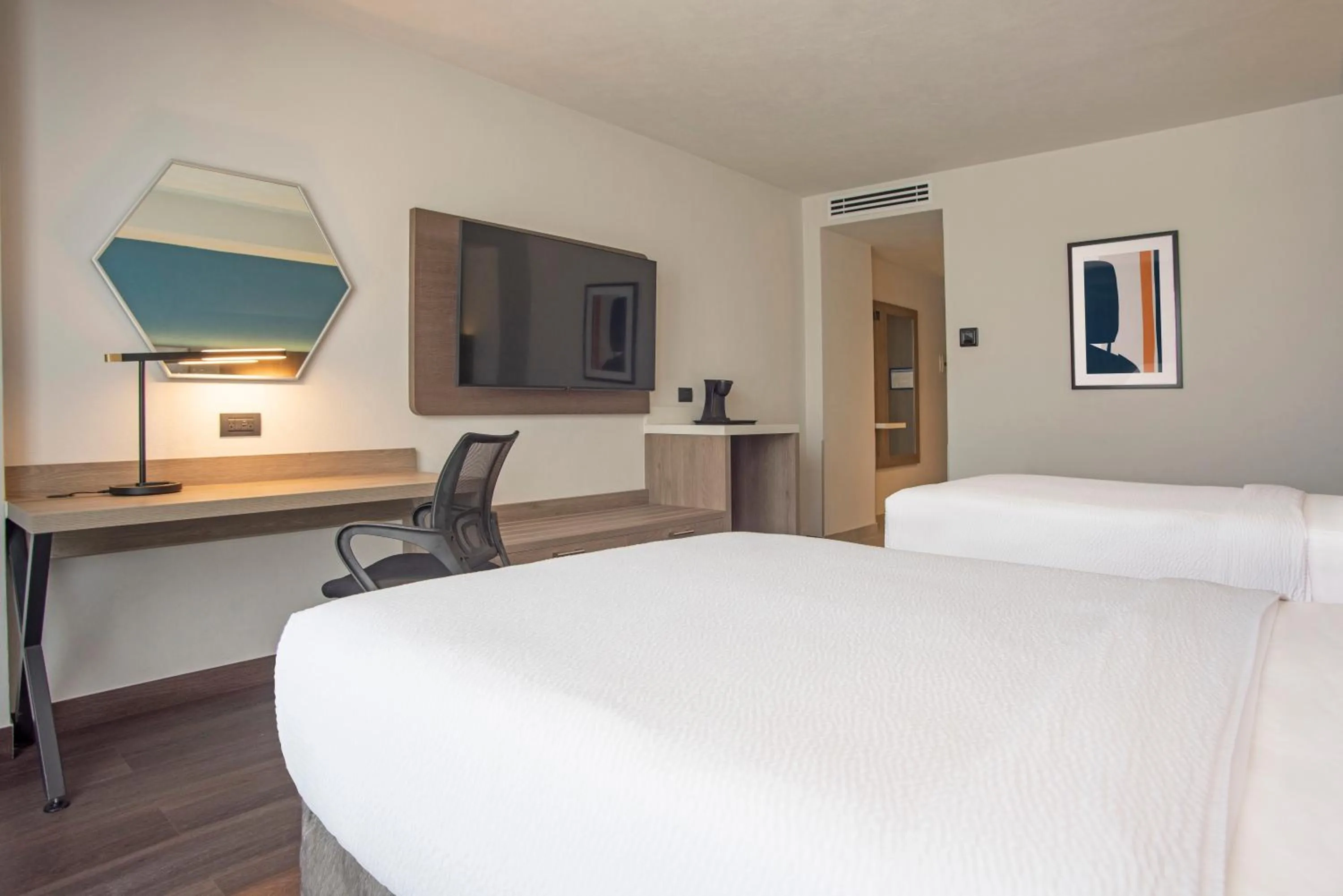 Bed in Holiday Inn Express Guadalajara Expo by IHG
