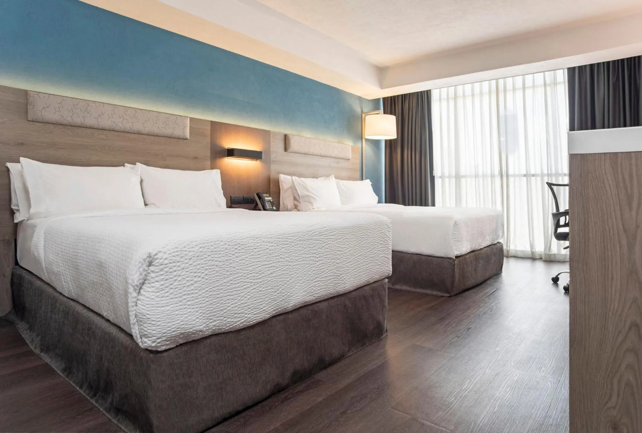 Photo of the whole room, Bed in Holiday Inn Express Guadalajara Expo by IHG