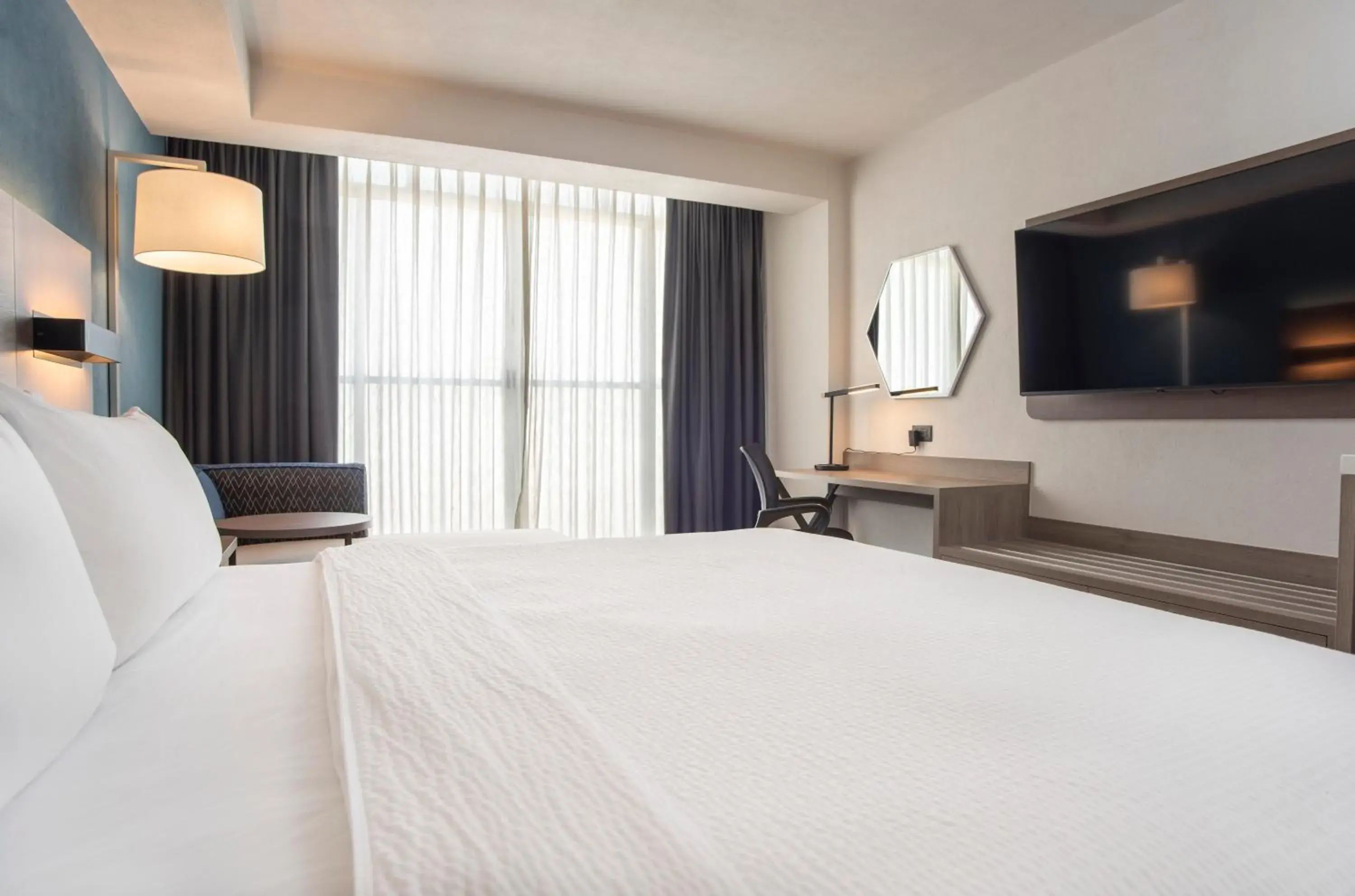 Bed in Holiday Inn Express Guadalajara Expo by IHG Bed in Holiday Inn Express Guadalajara Expo by IHG