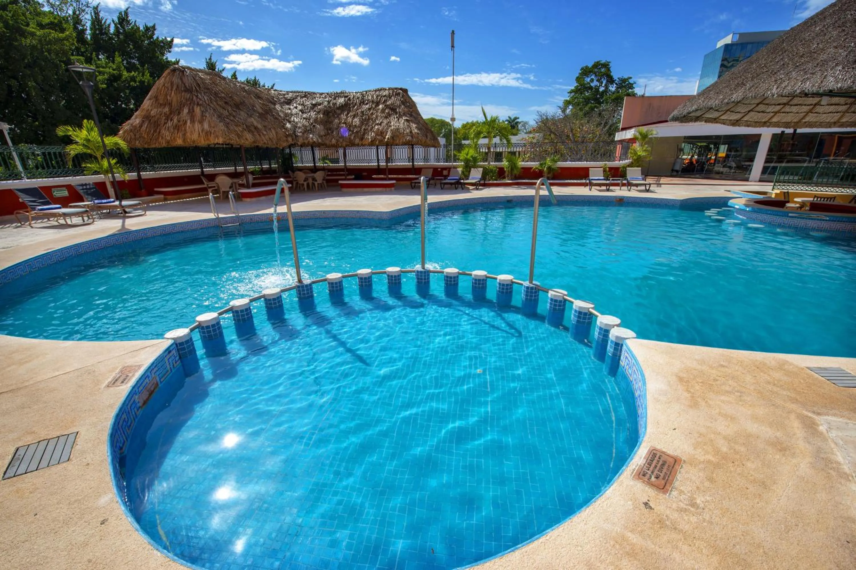 Swimming pool in Holiday Inn Merida by IHG
