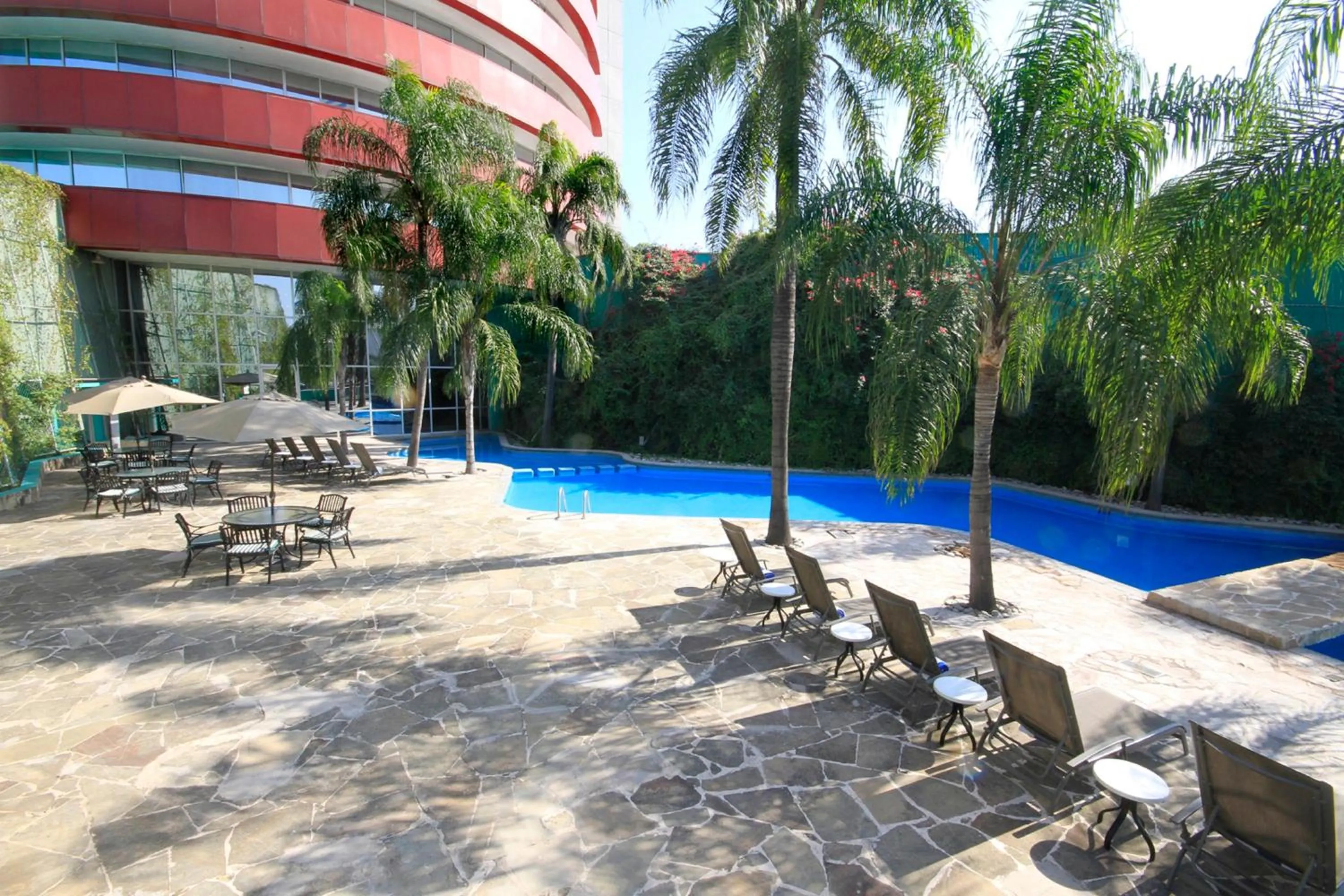 Swimming pool in Holiday Inn Monterrey-Parque Fundidora by IHG