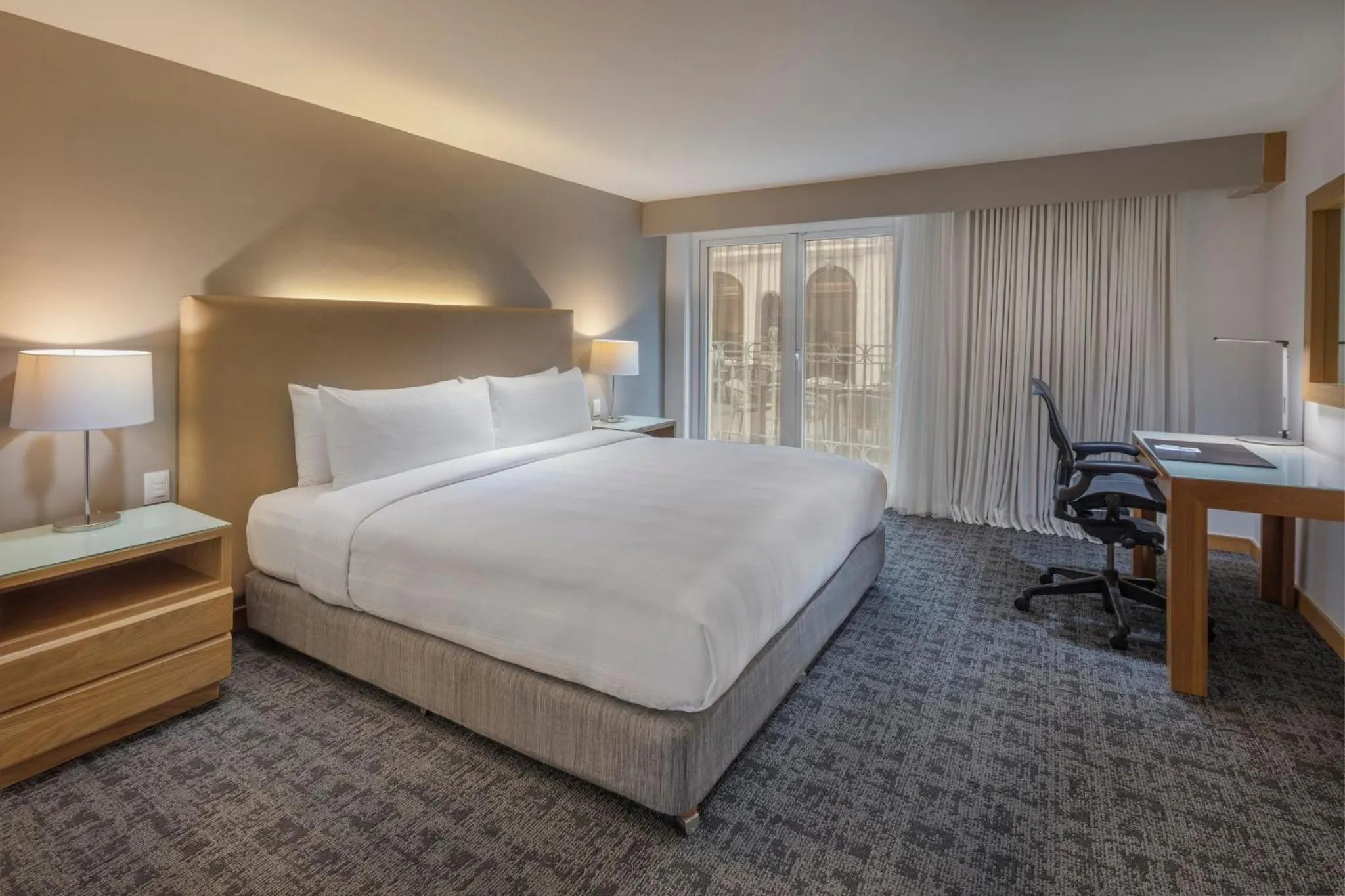 Photo of the whole room, Bed in Presidente InterContinental Puebla by IHG