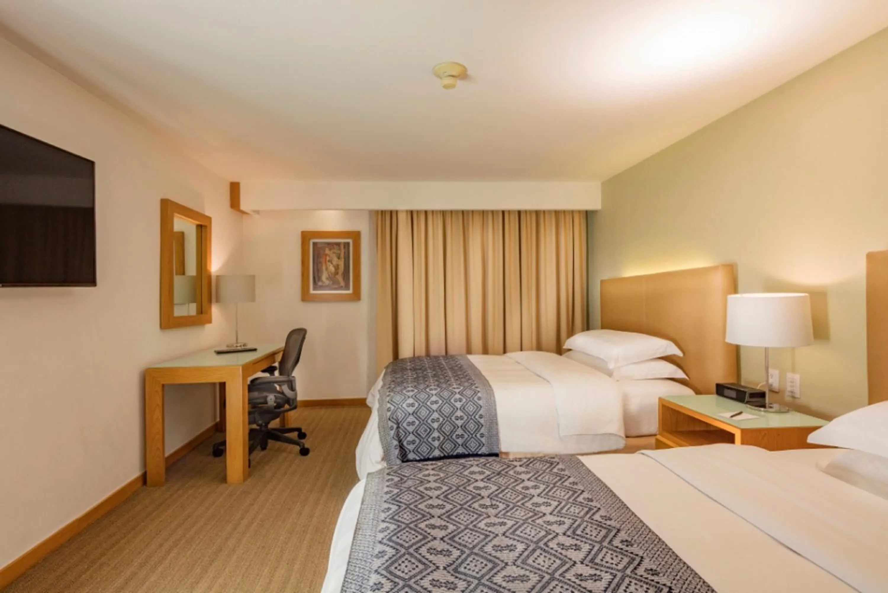 Bed in Presidente InterContinental Puebla by IHG