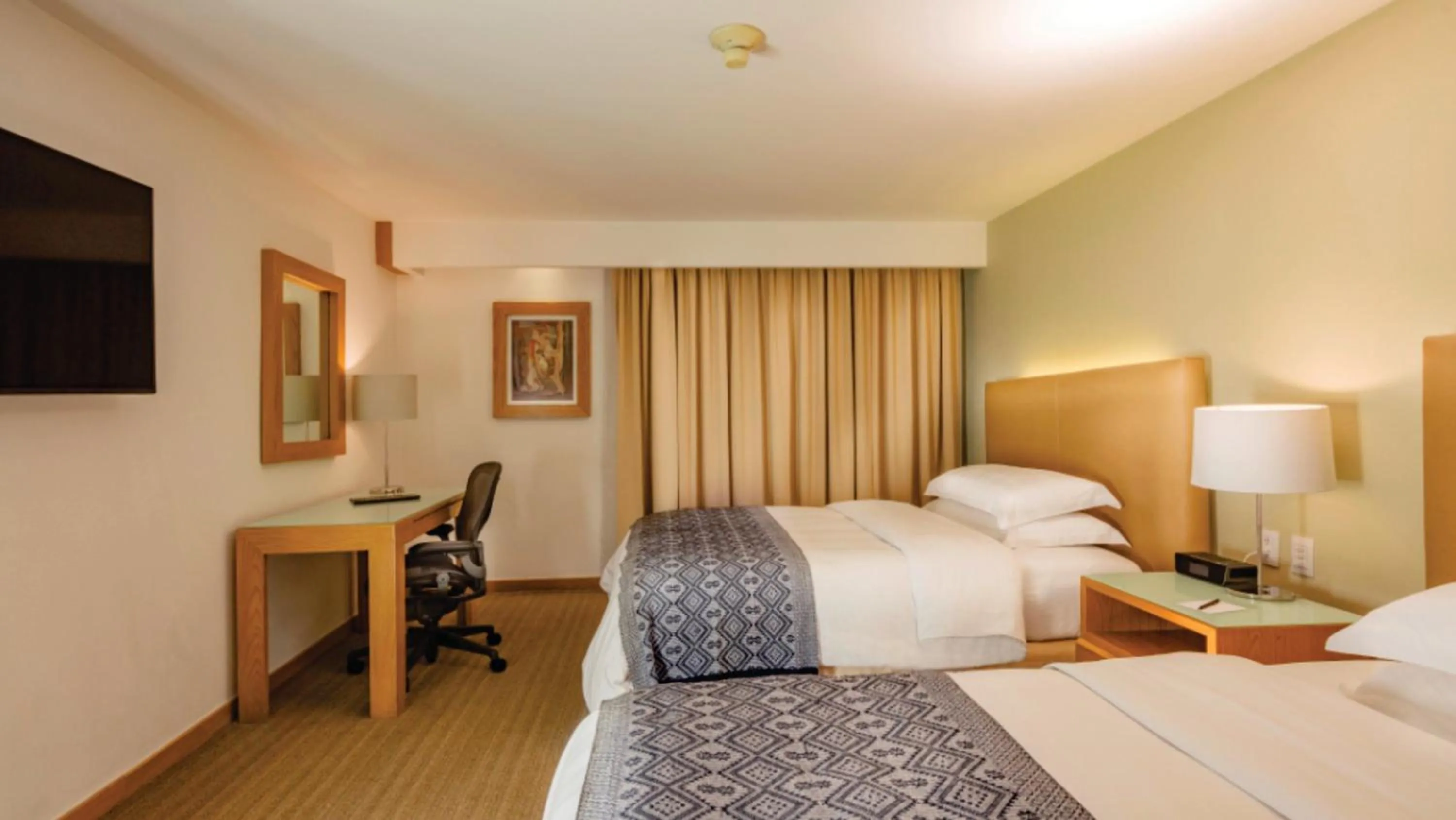 Photo of the whole room, Bed in Presidente InterContinental Puebla by IHG