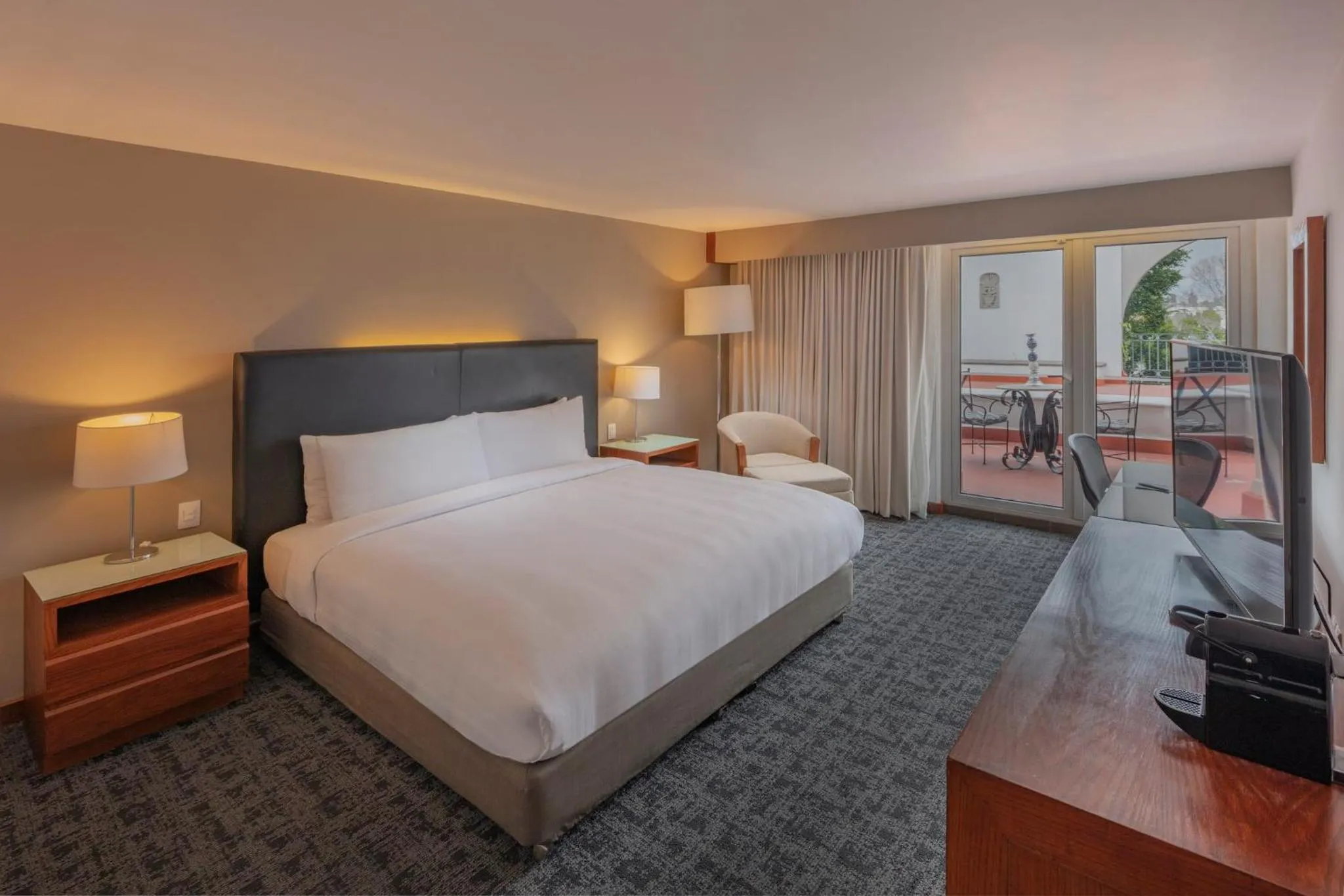 Photo of the whole room, Bed in Presidente InterContinental Puebla by IHG