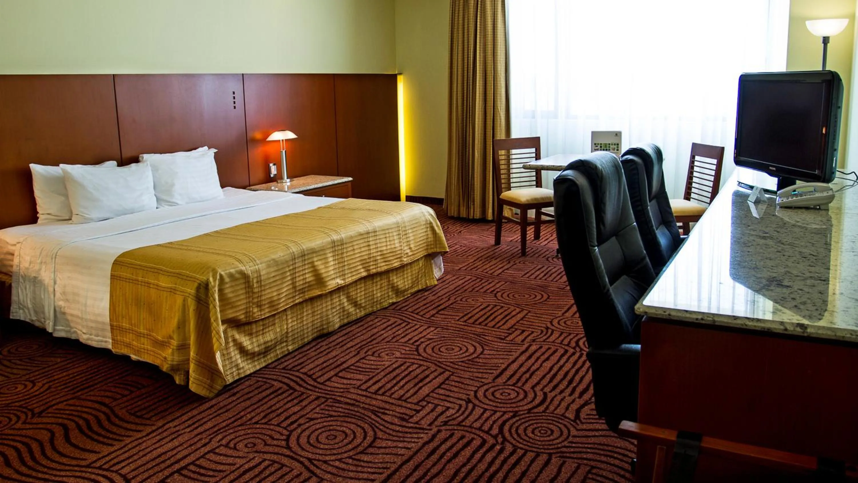 Photo of the whole room, Bed in Holiday Inn Puebla Finsa by IHG