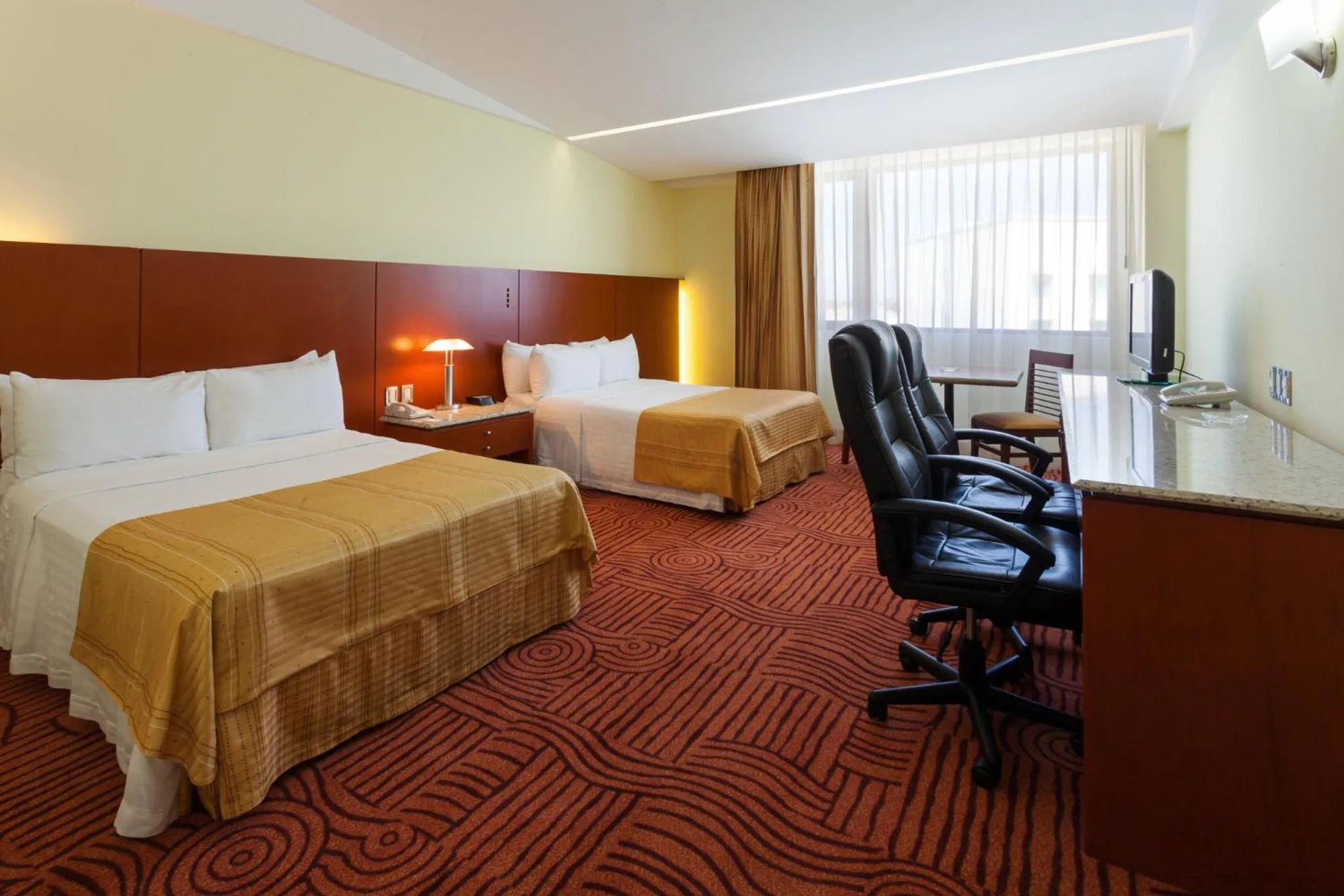 Photo of the whole room, Bed in Holiday Inn Puebla Finsa by IHG