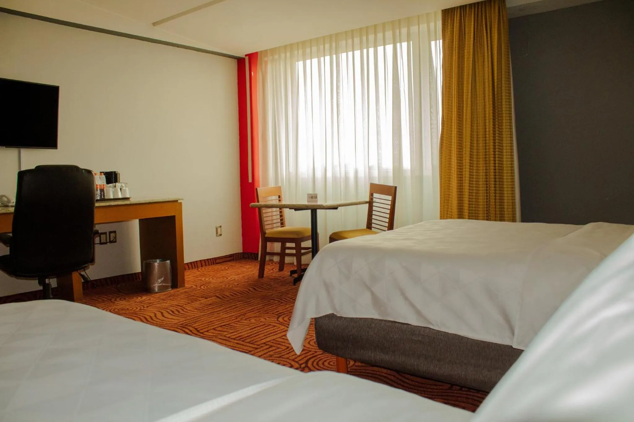 Photo of the whole room, Bed in Holiday Inn Puebla Finsa by IHG