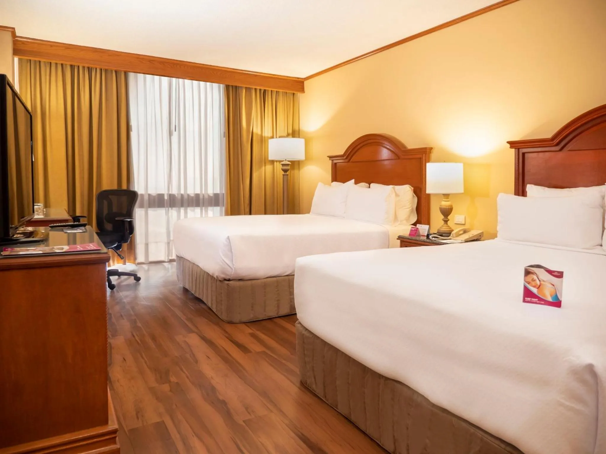 Photo of the whole room, Bed in Crowne Plaza Hotel Monterrey by IHG