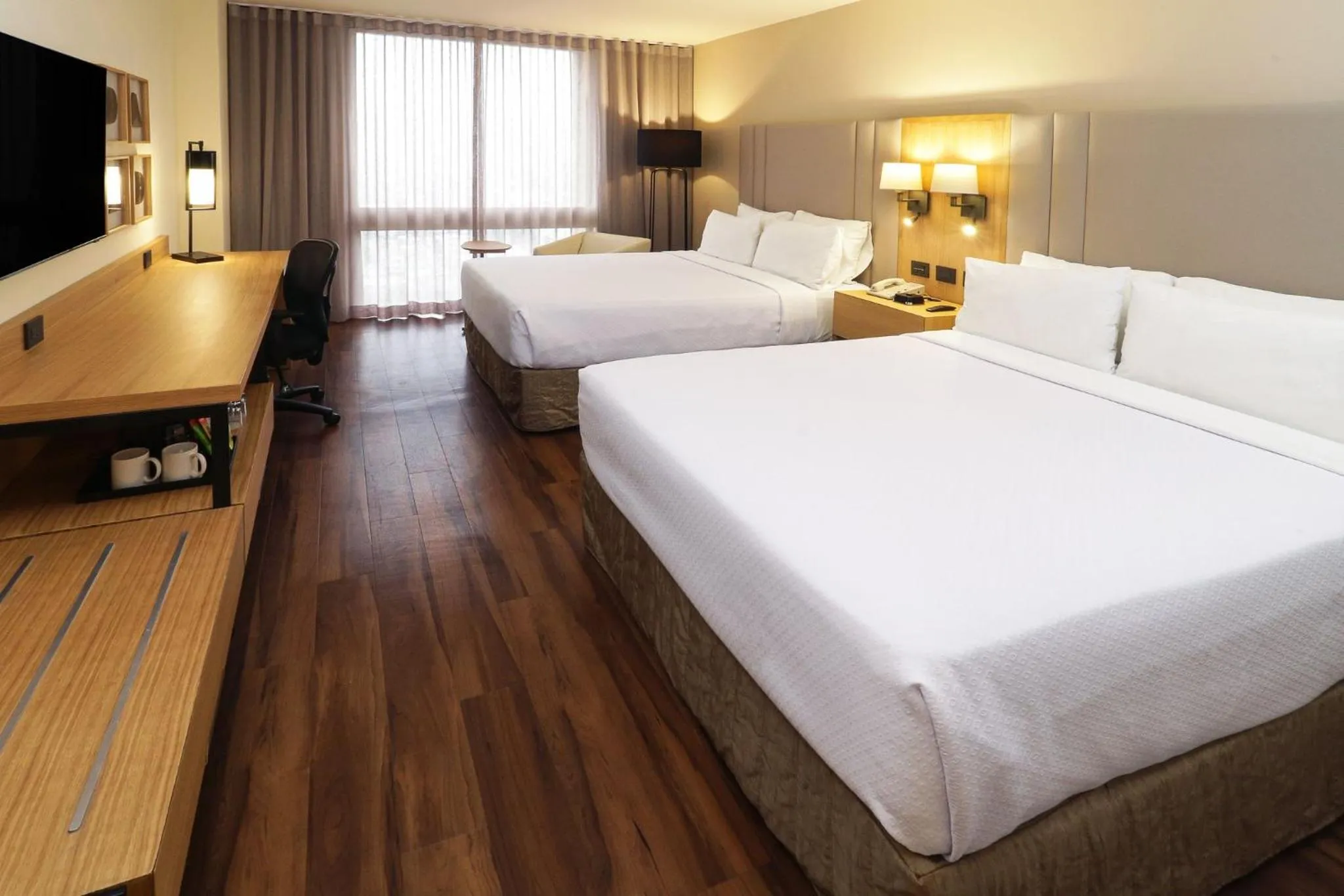 Photo of the whole room, Bed in Crowne Plaza Hotel Monterrey by IHG