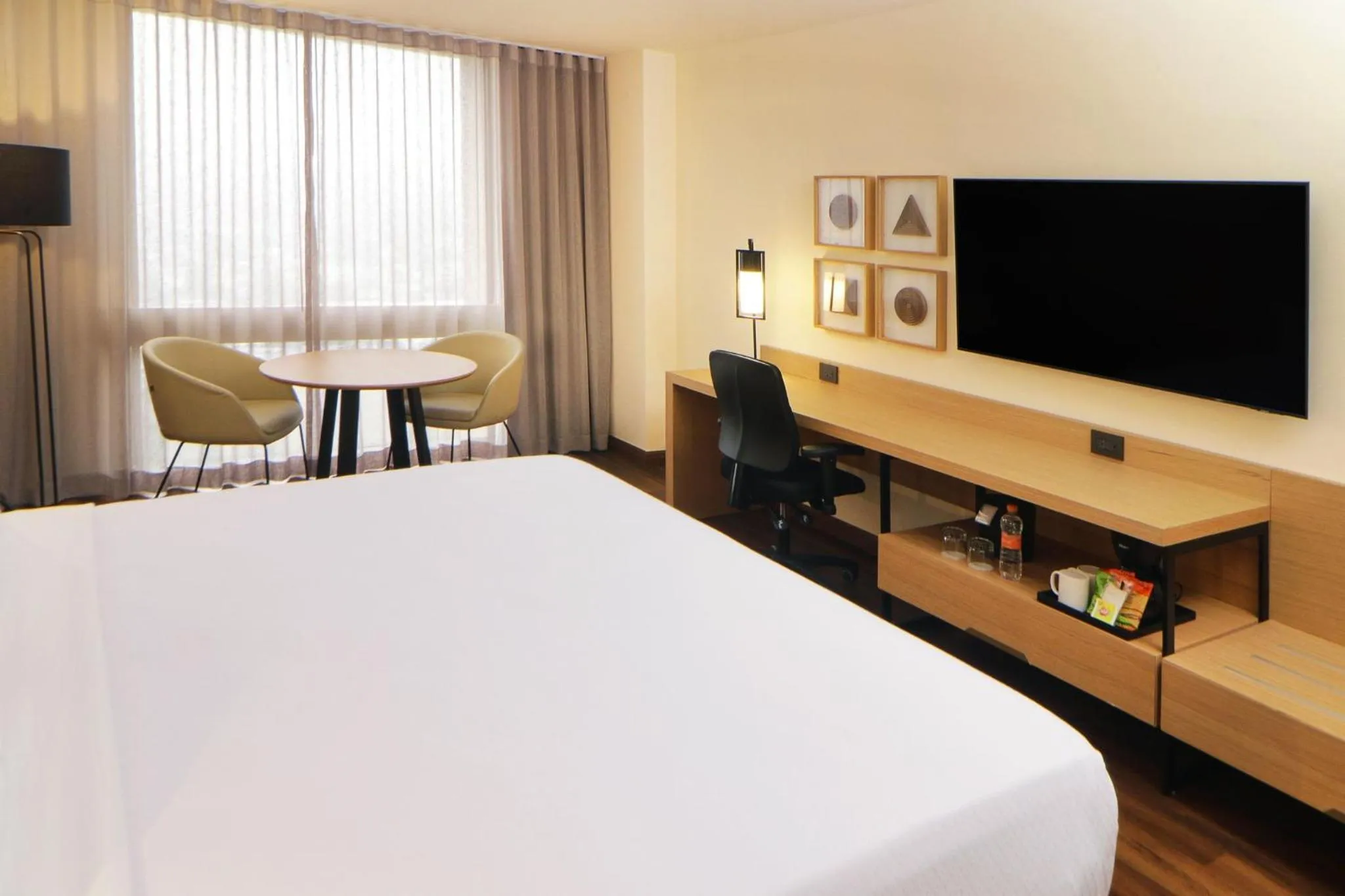Photo of the whole room, Bed in Crowne Plaza Hotel Monterrey by IHG