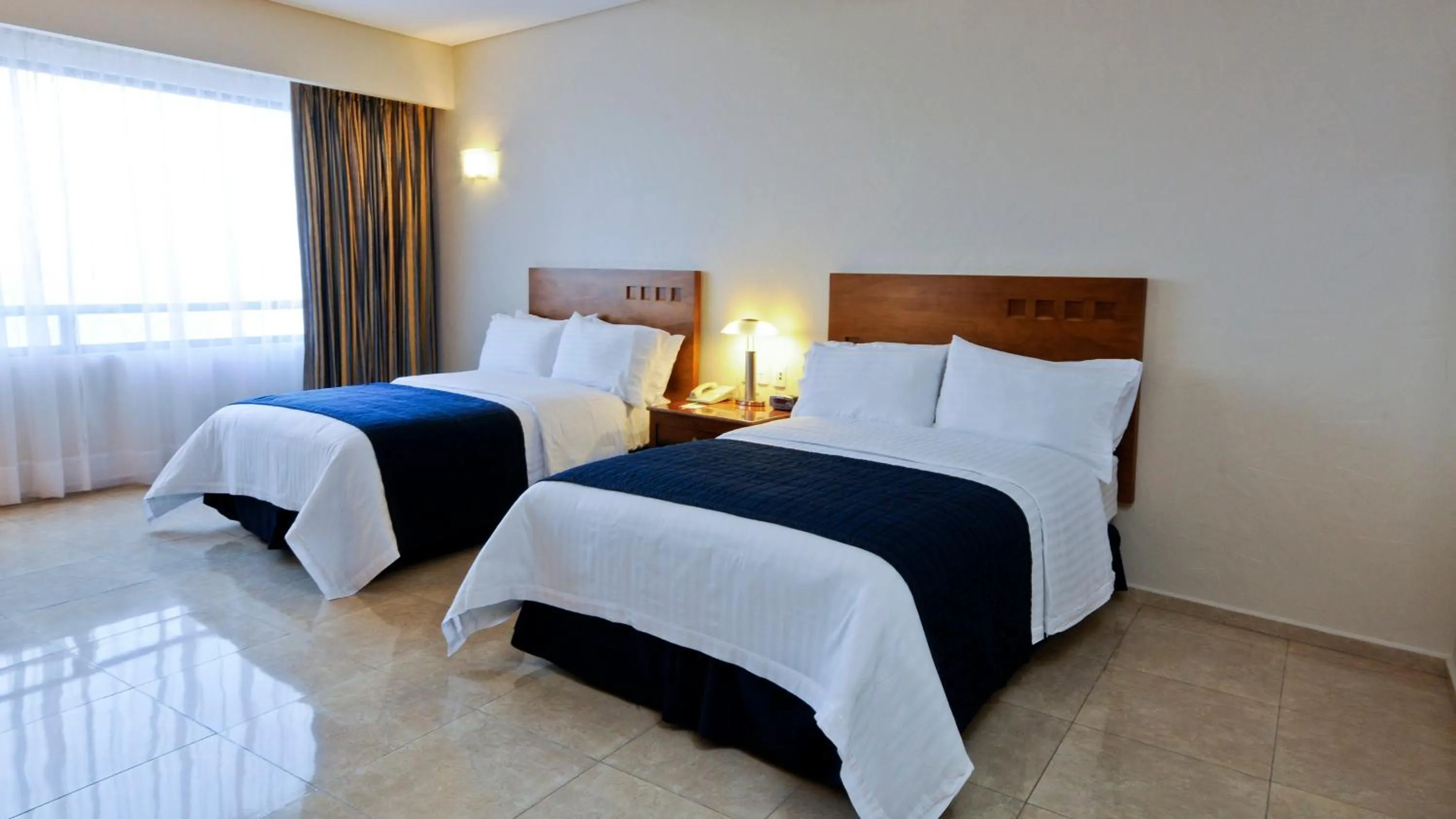 Photo of the whole room, Bed in Holiday Inn Veracruz-Boca Del Rio by IHG
