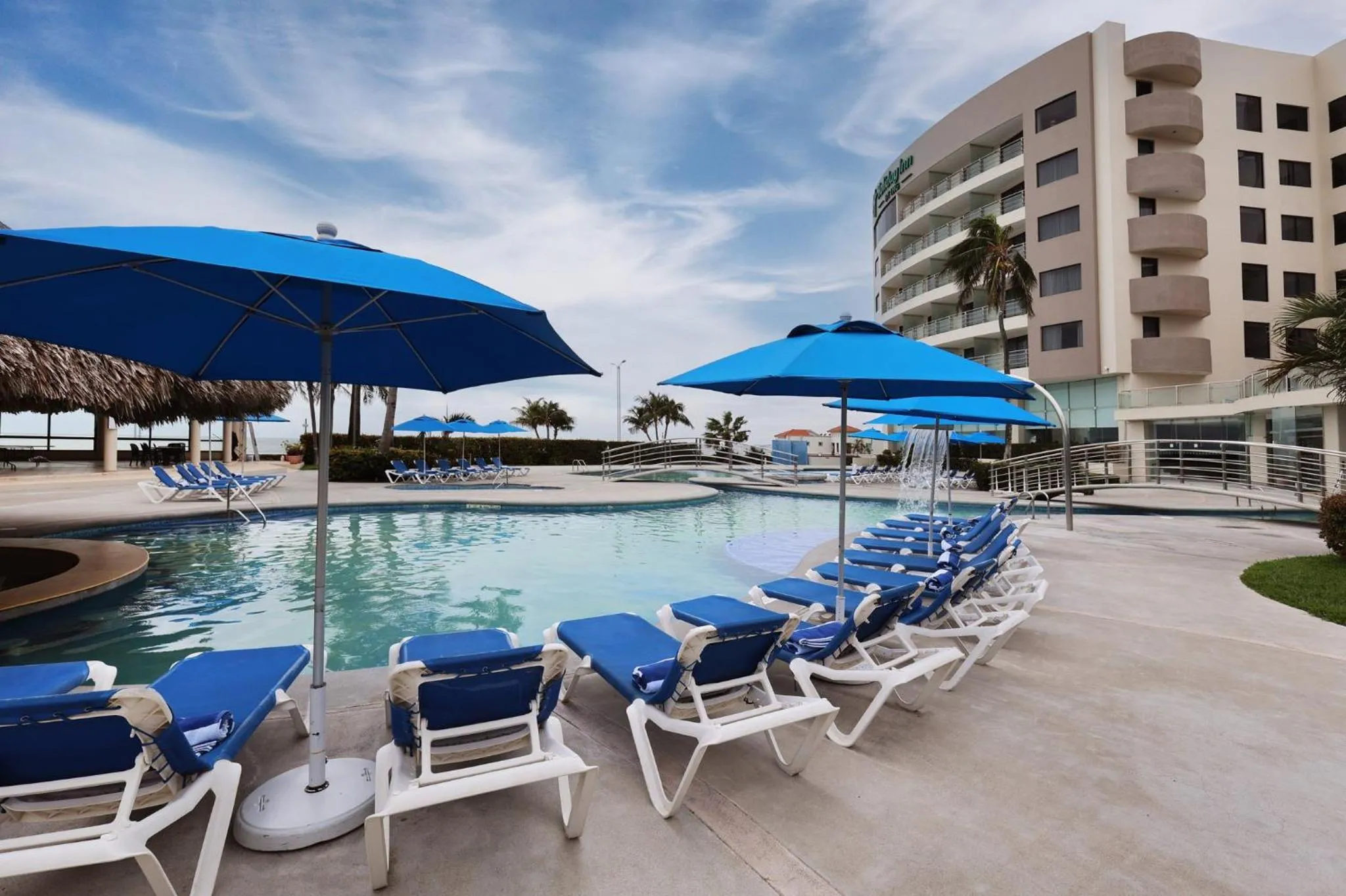Swimming pool in Holiday Inn Veracruz-Boca Del Rio by IHG