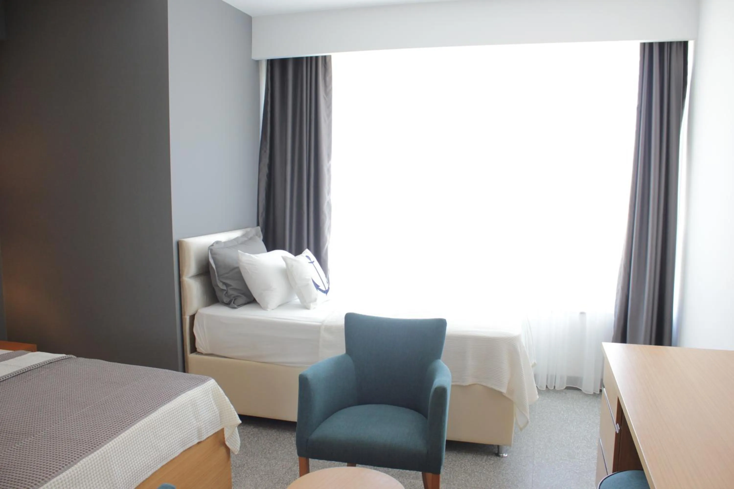 Bed in Port Marina Hotel