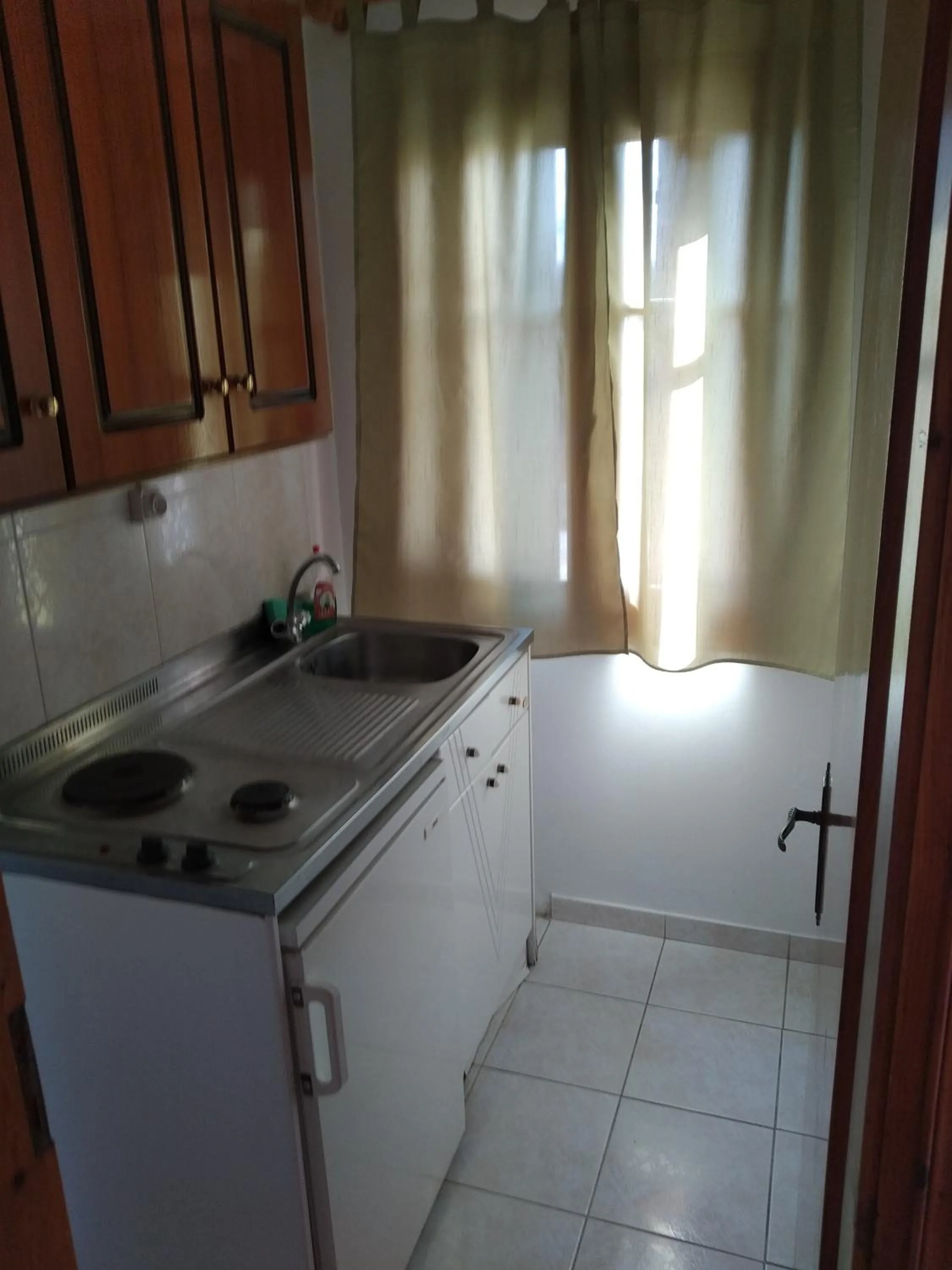 Kitchen or kitchenette in Joanna Rooms