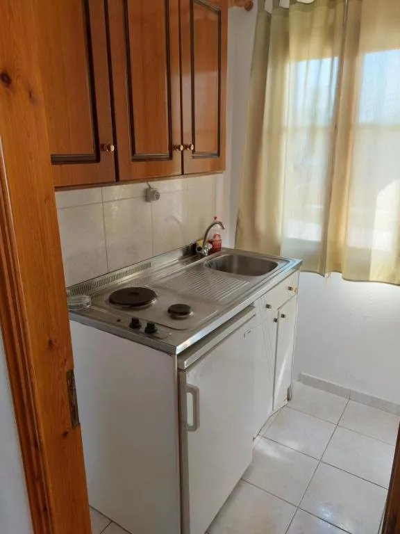 Kitchen or kitchenette in Joanna Rooms