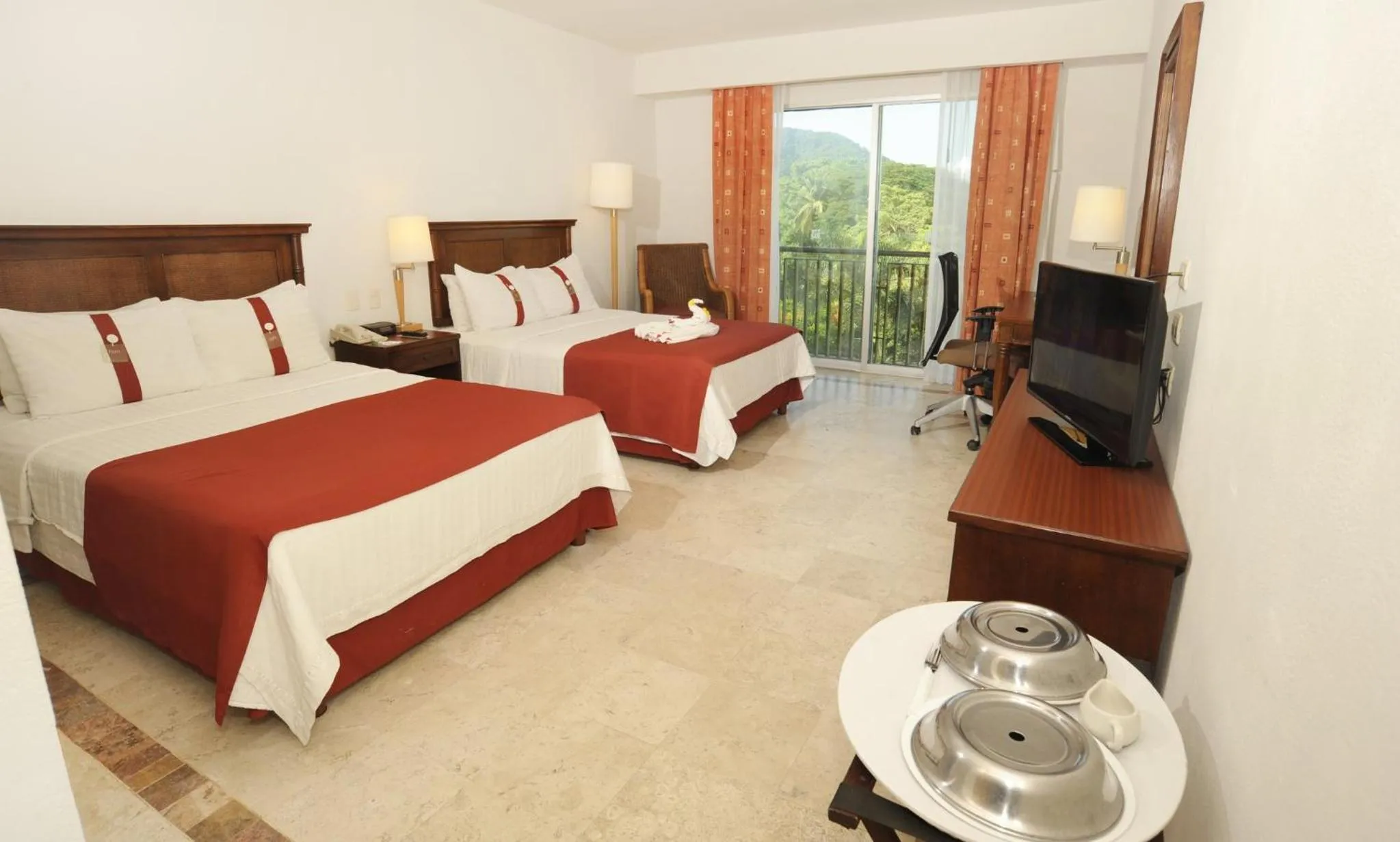 Photo of the whole room, Bed in Gamma Plaza Ixtapa