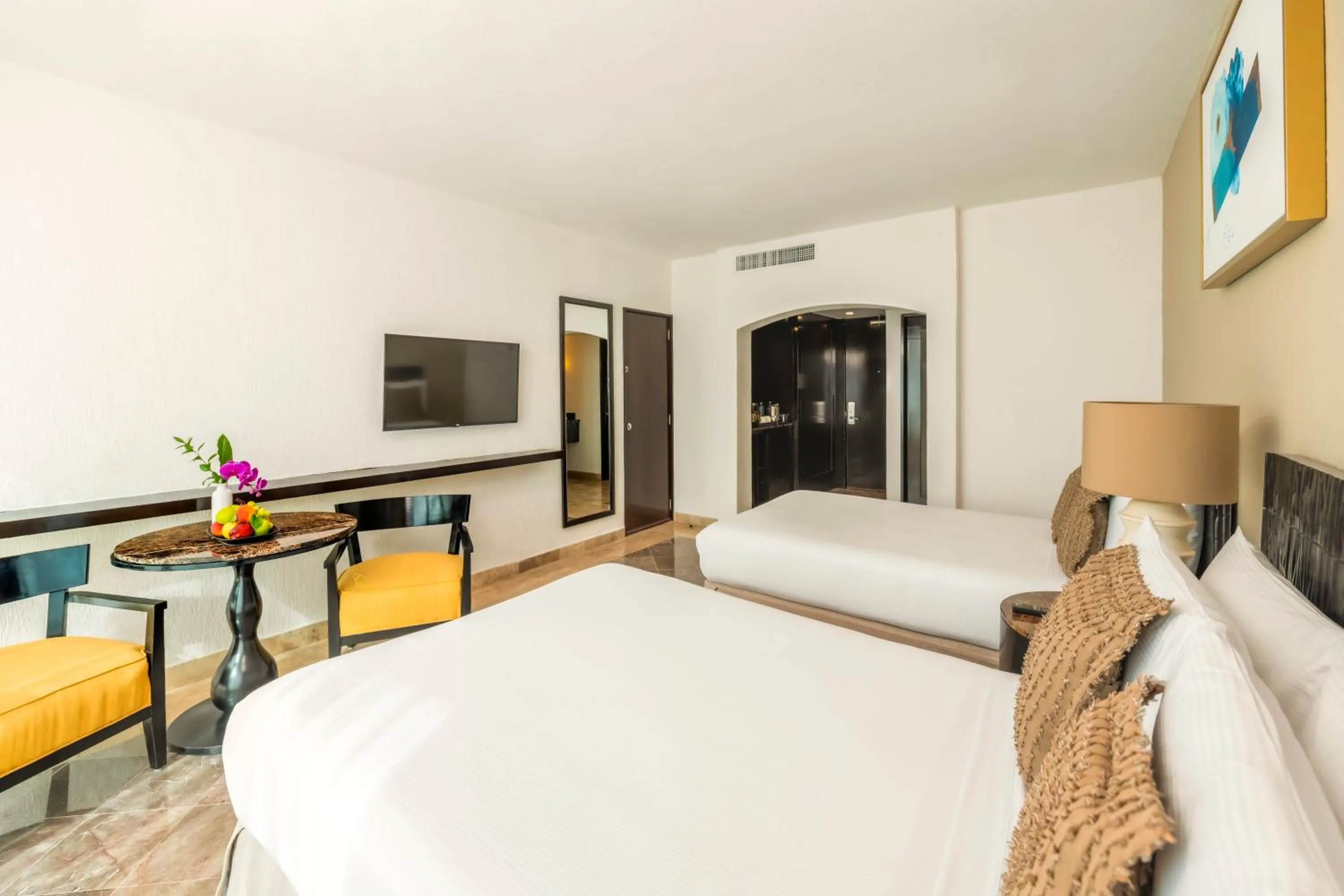 Bed in Krystal Grand Cancun All Inclusive