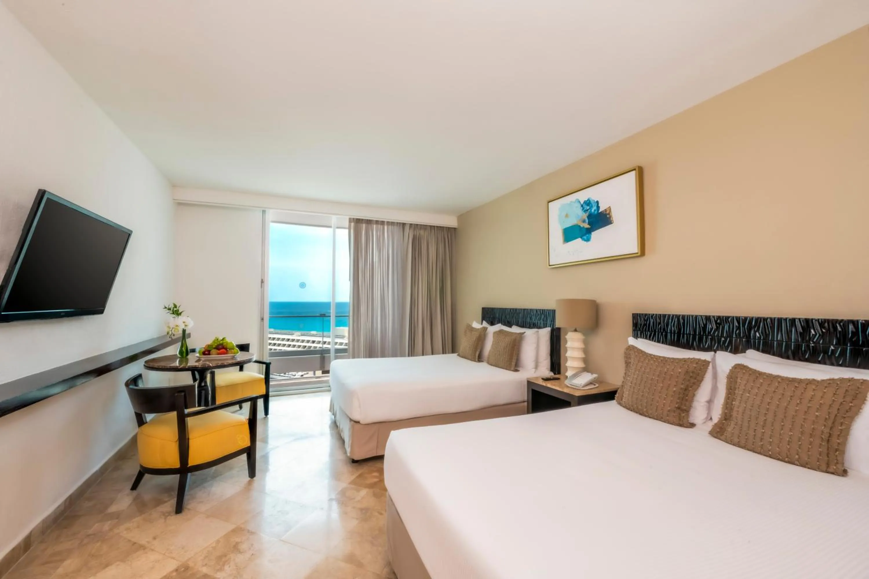 Bed in Krystal Grand Cancun All Inclusive