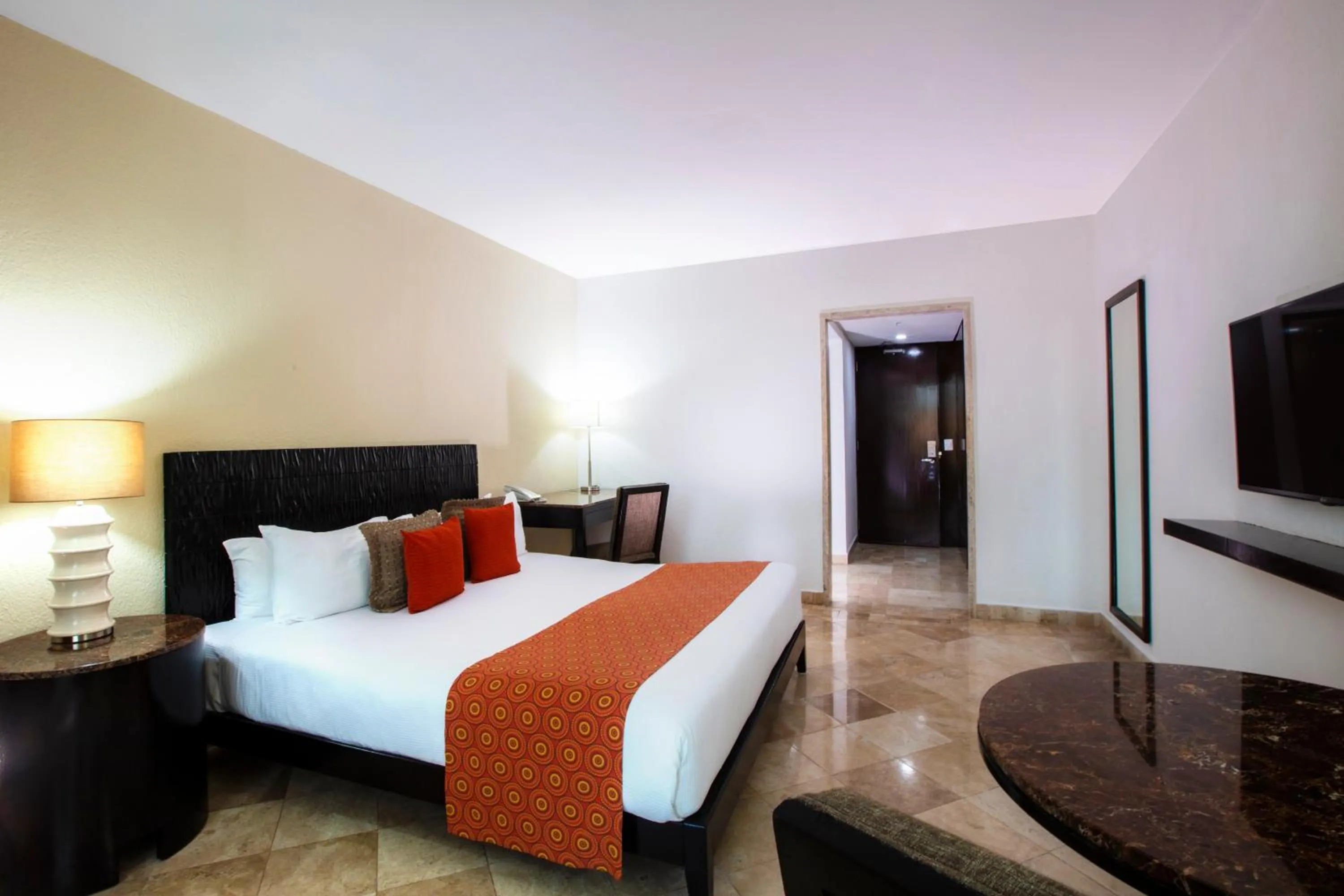 Bed in Krystal Grand Cancun All Inclusive