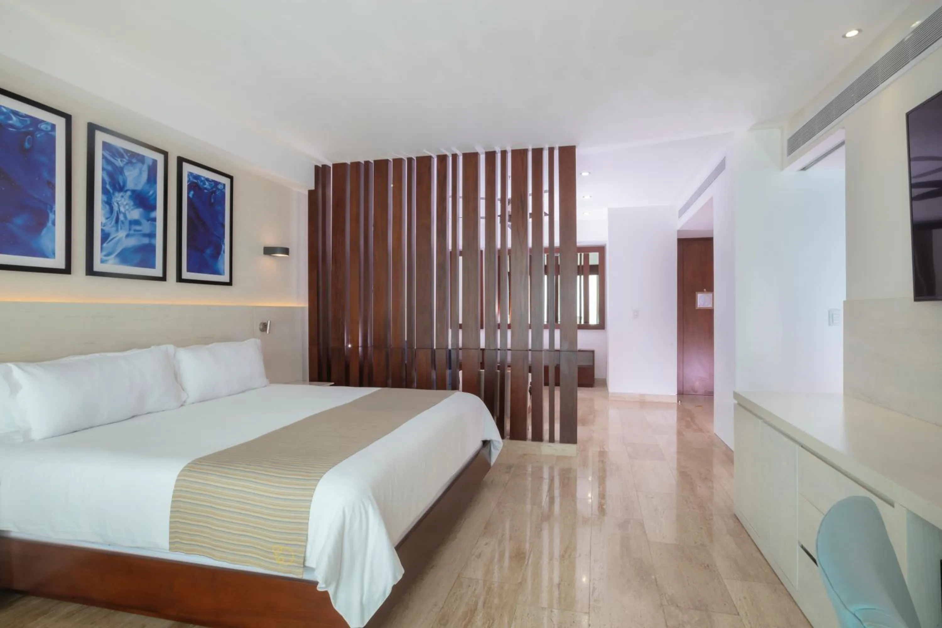 Bed in Krystal Grand Cancun All Inclusive