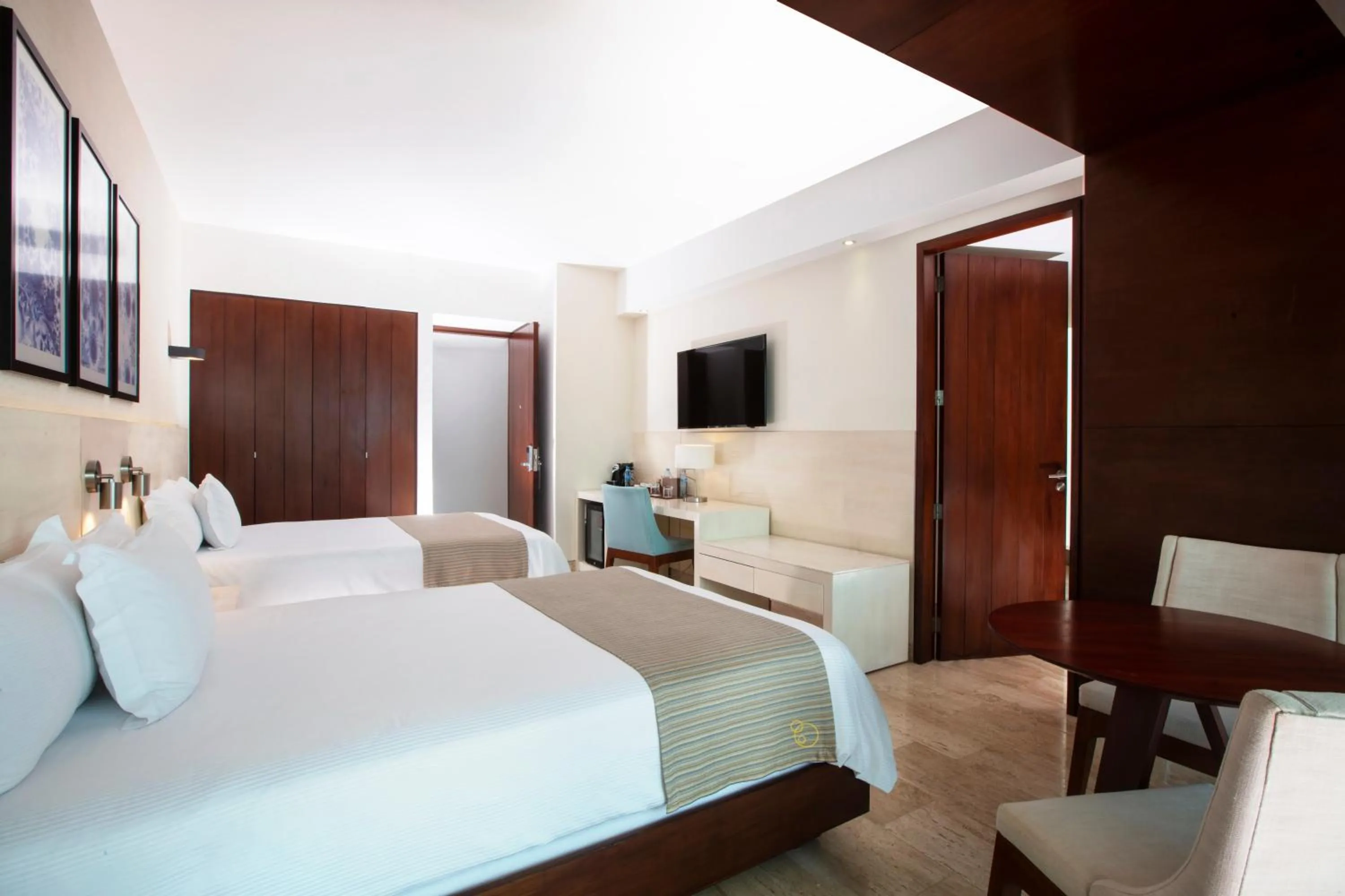 Bed in Krystal Grand Cancun All Inclusive