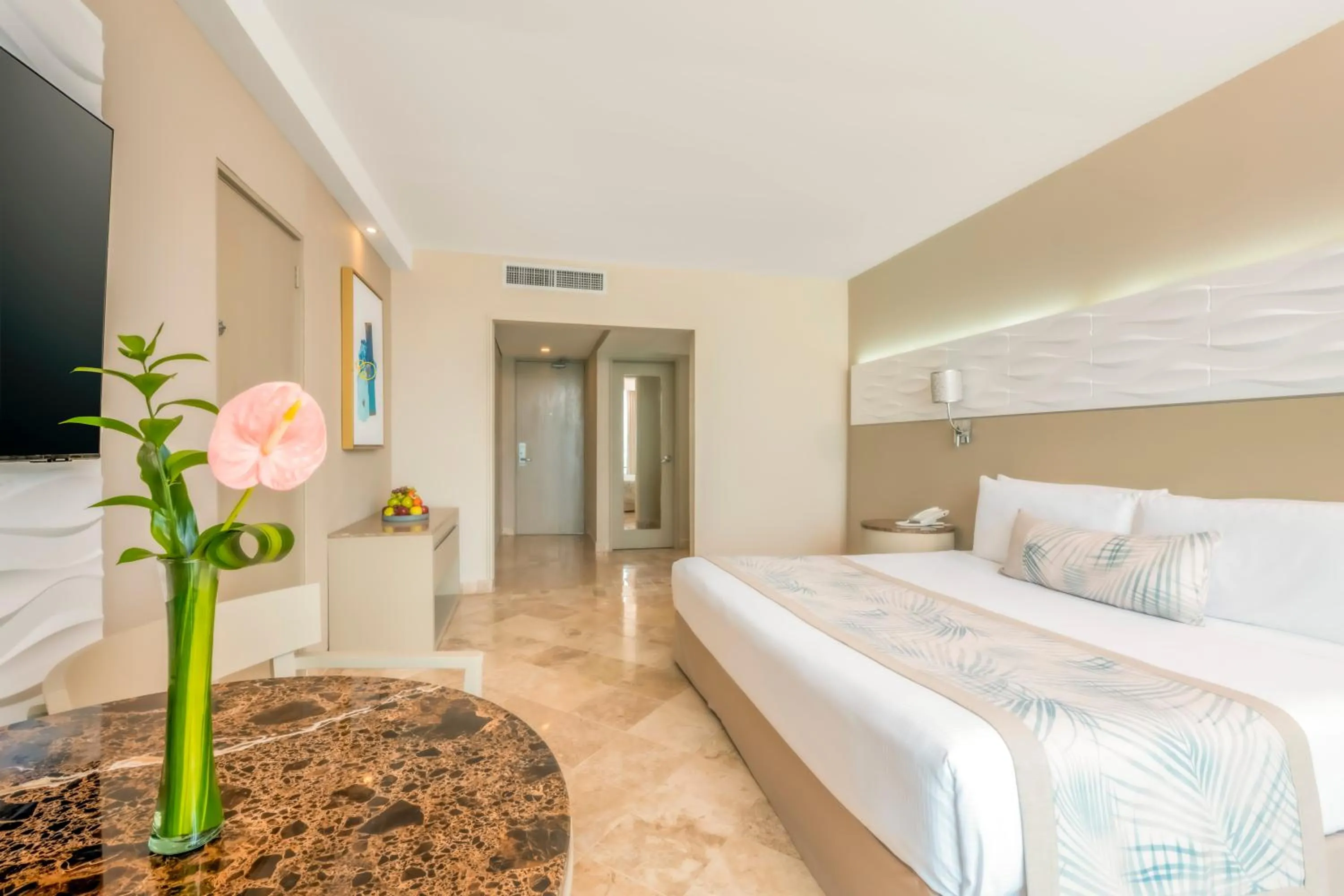 Bed in Krystal Grand Cancun All Inclusive