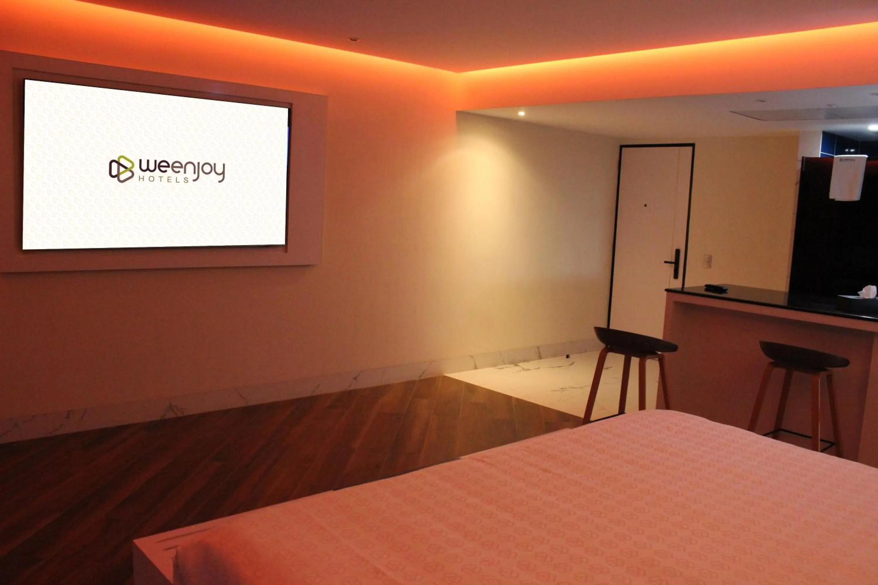 Bed in WeEnjoy Hotels Grand Prix Aeropuerto CDMX