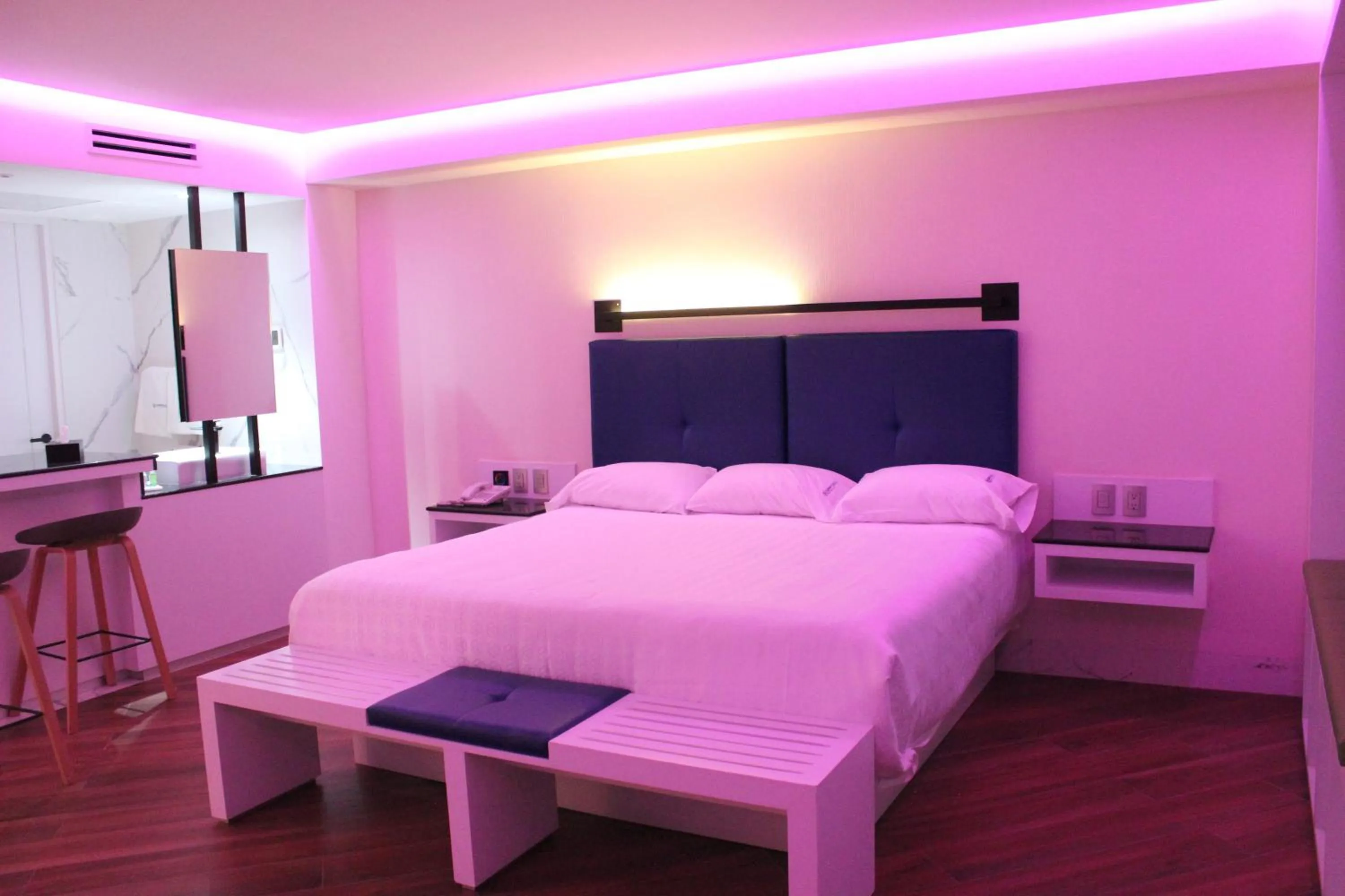 Bed in WeEnjoy Hotels Grand Prix Aeropuerto CDMX