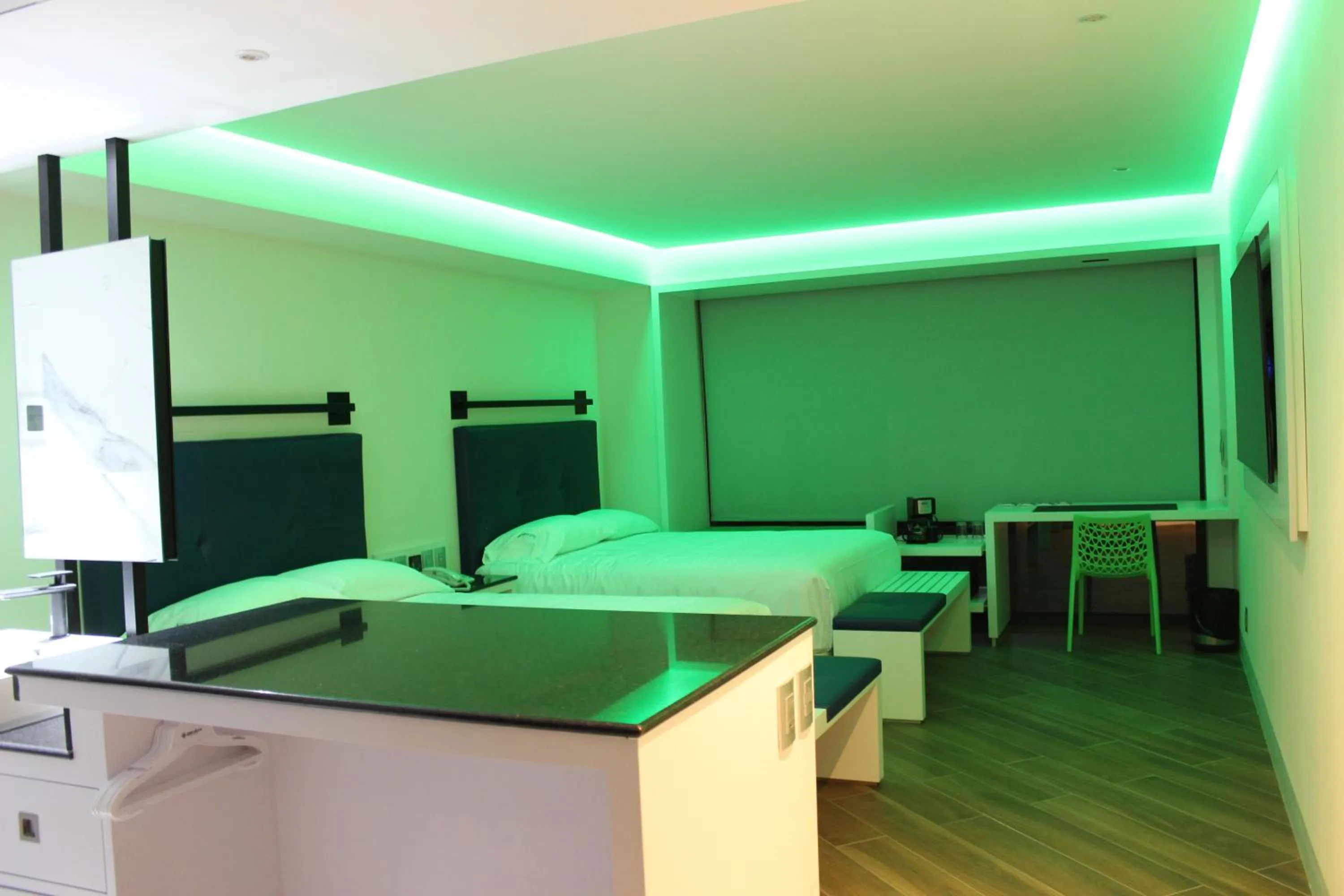 Bedroom, Bed in WeEnjoy Hotels Grand Prix Aeropuerto CDMX