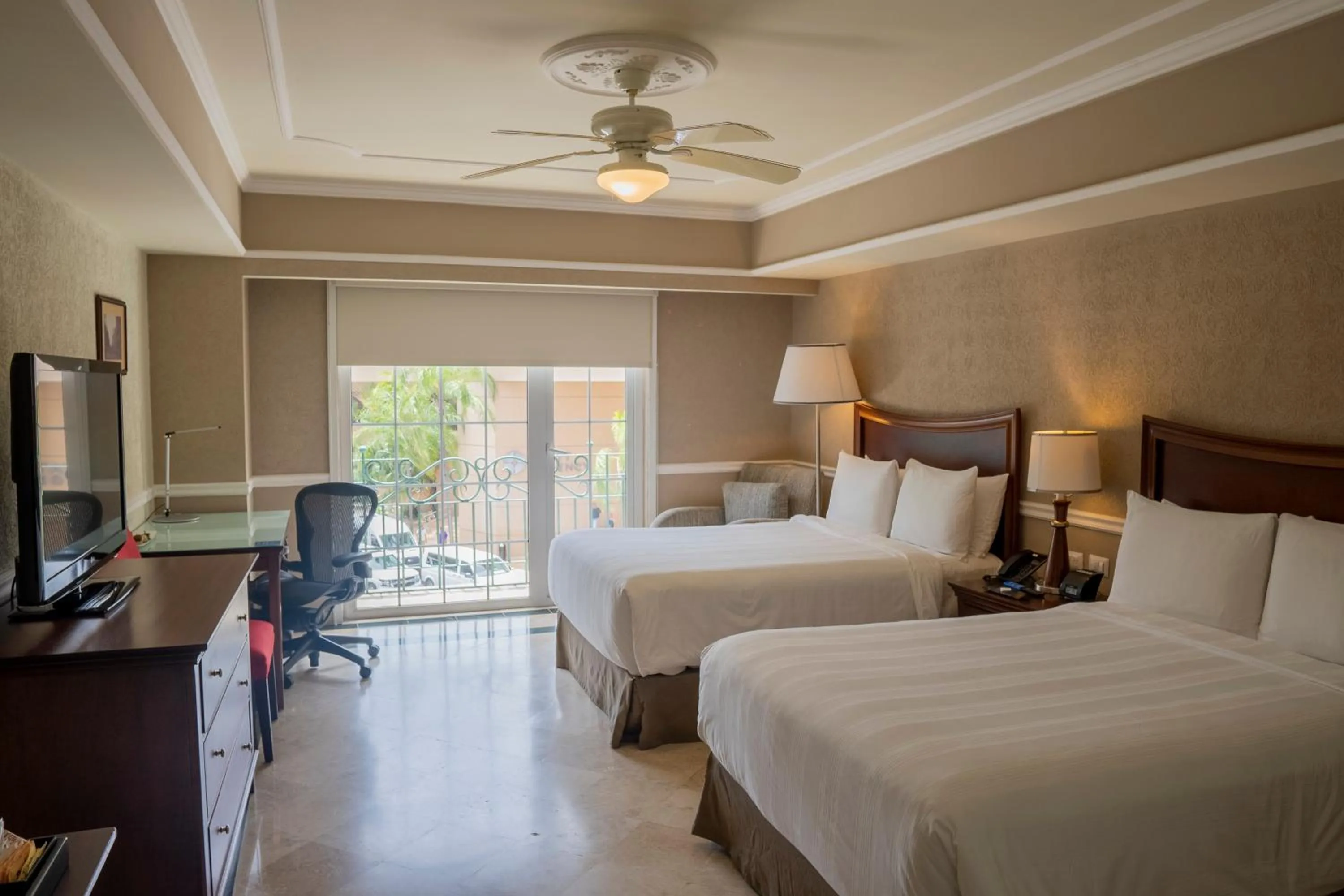 Photo of the whole room, Bed in Villa Mercedes Curio Collection By Hilton