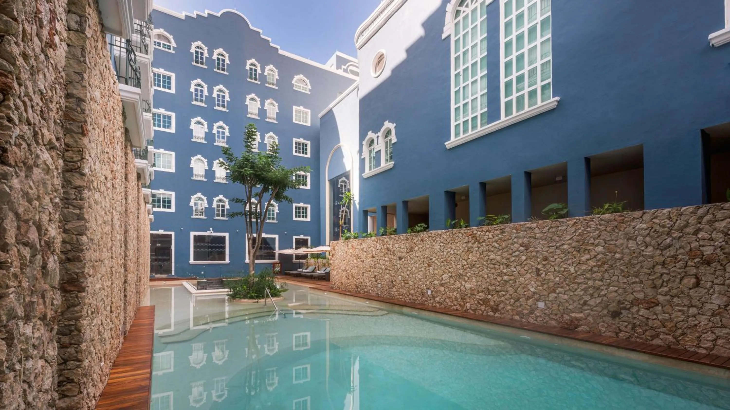 Pool view in Villa Mercedes Curio Collection By Hilton