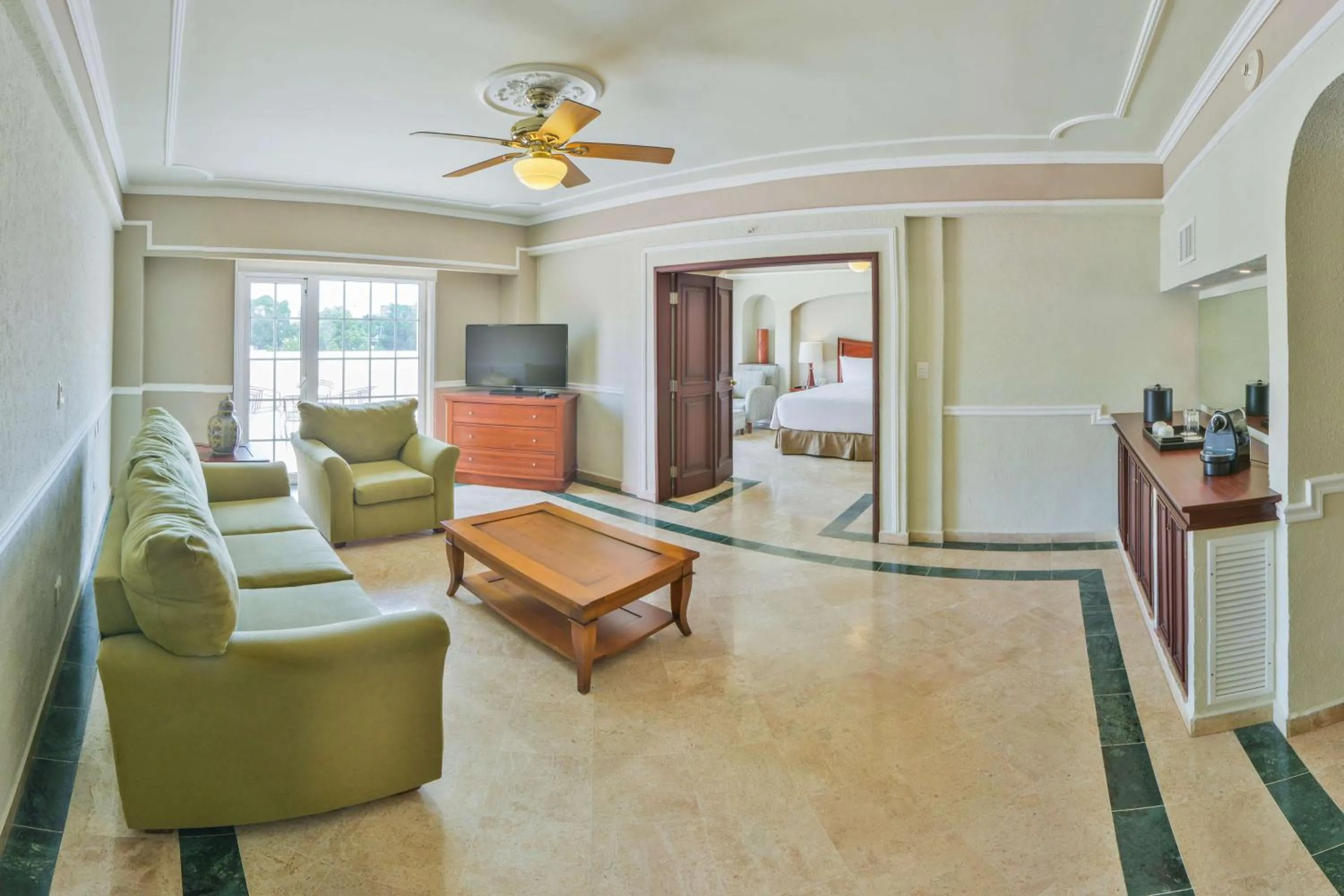 Living room in Villa Mercedes Curio Collection By Hilton