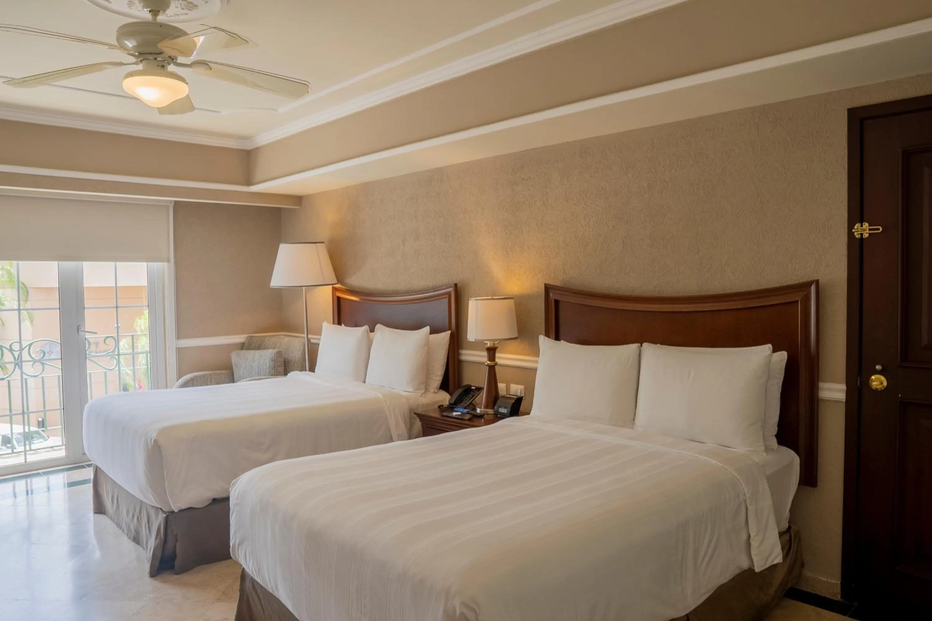 Bed in Villa Mercedes Curio Collection By Hilton