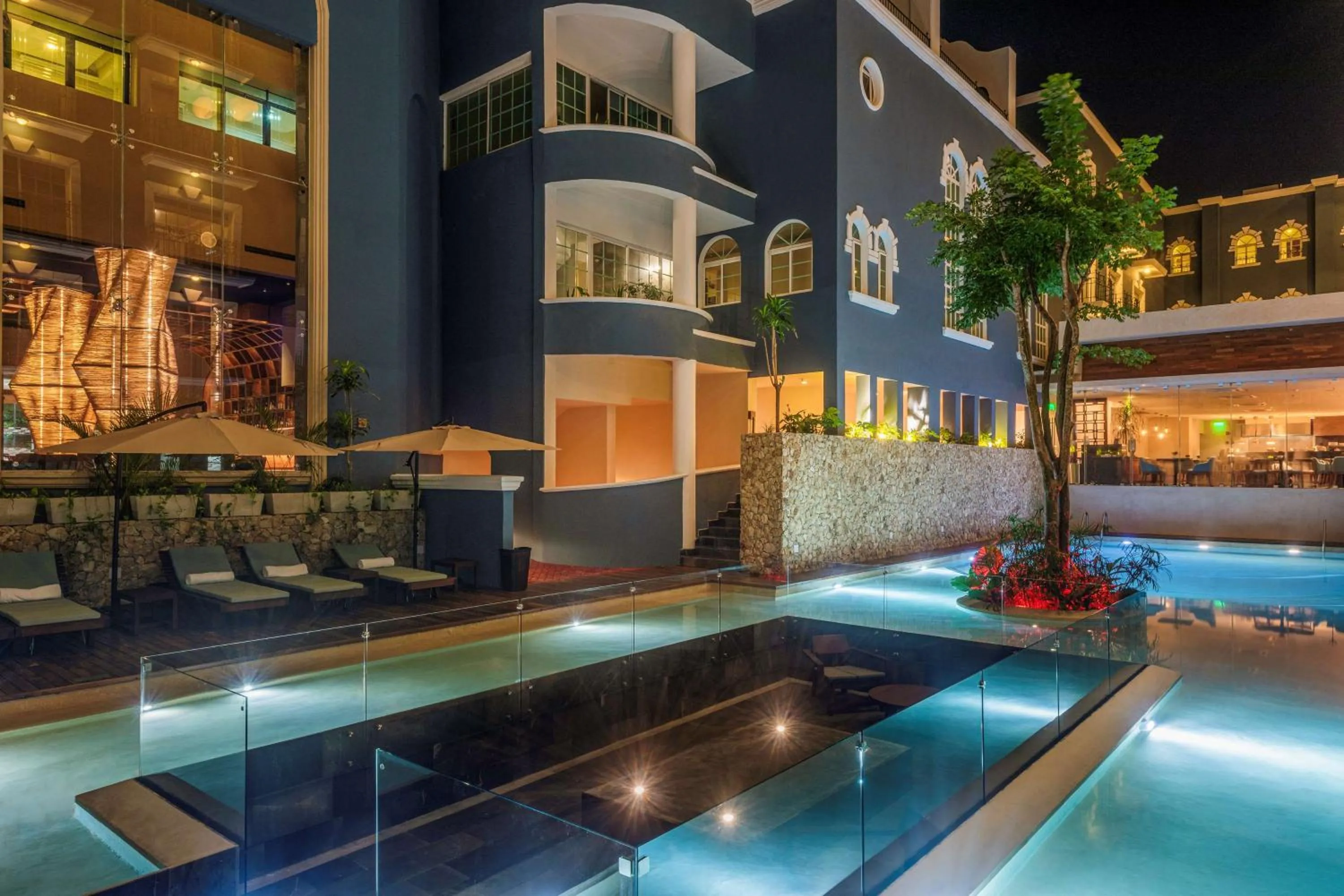 Pool view in Villa Mercedes Curio Collection By Hilton