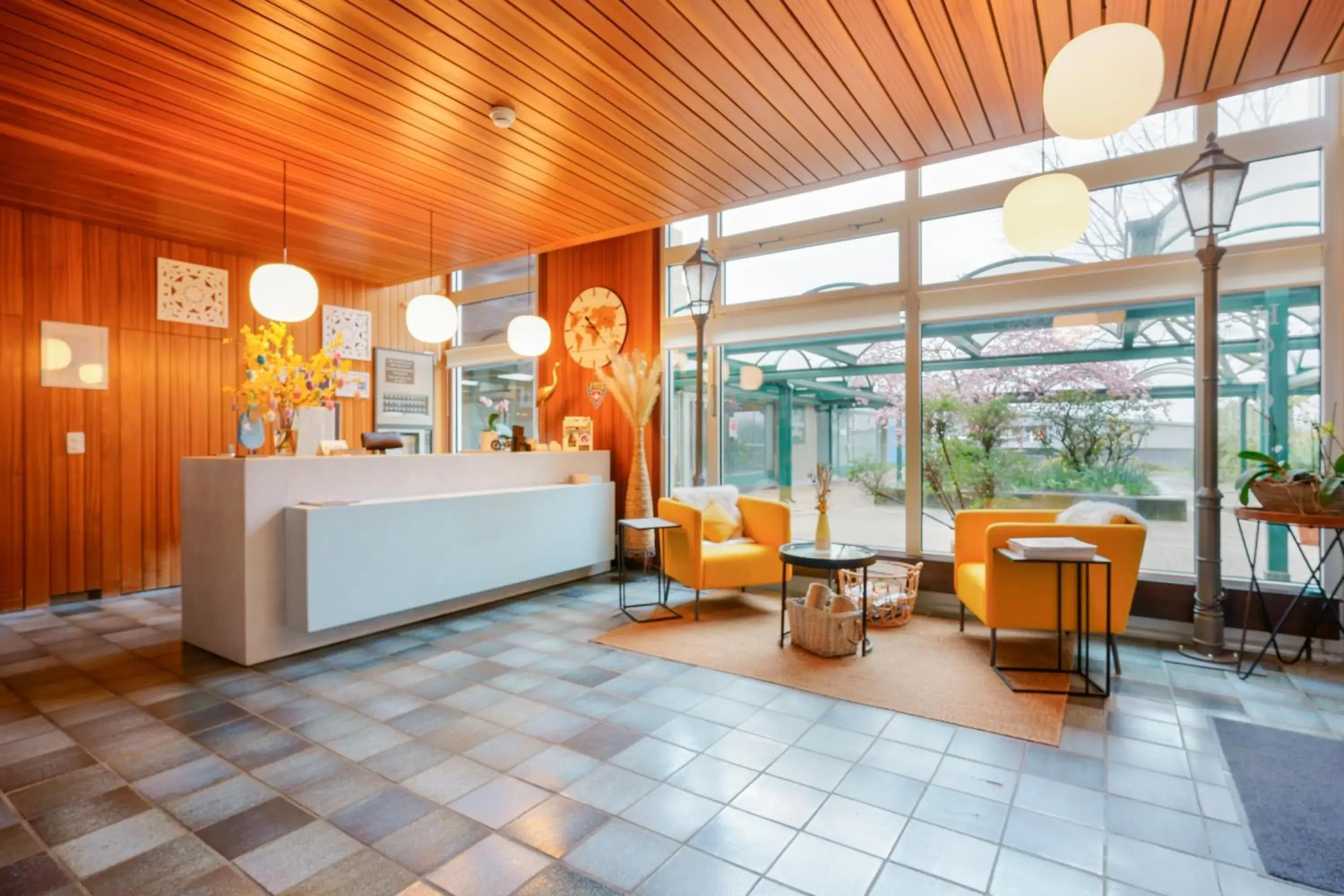 Lobby or reception in Hôtel du Grand-Pré Lobby or reception in Hôtel du Grand-Pré