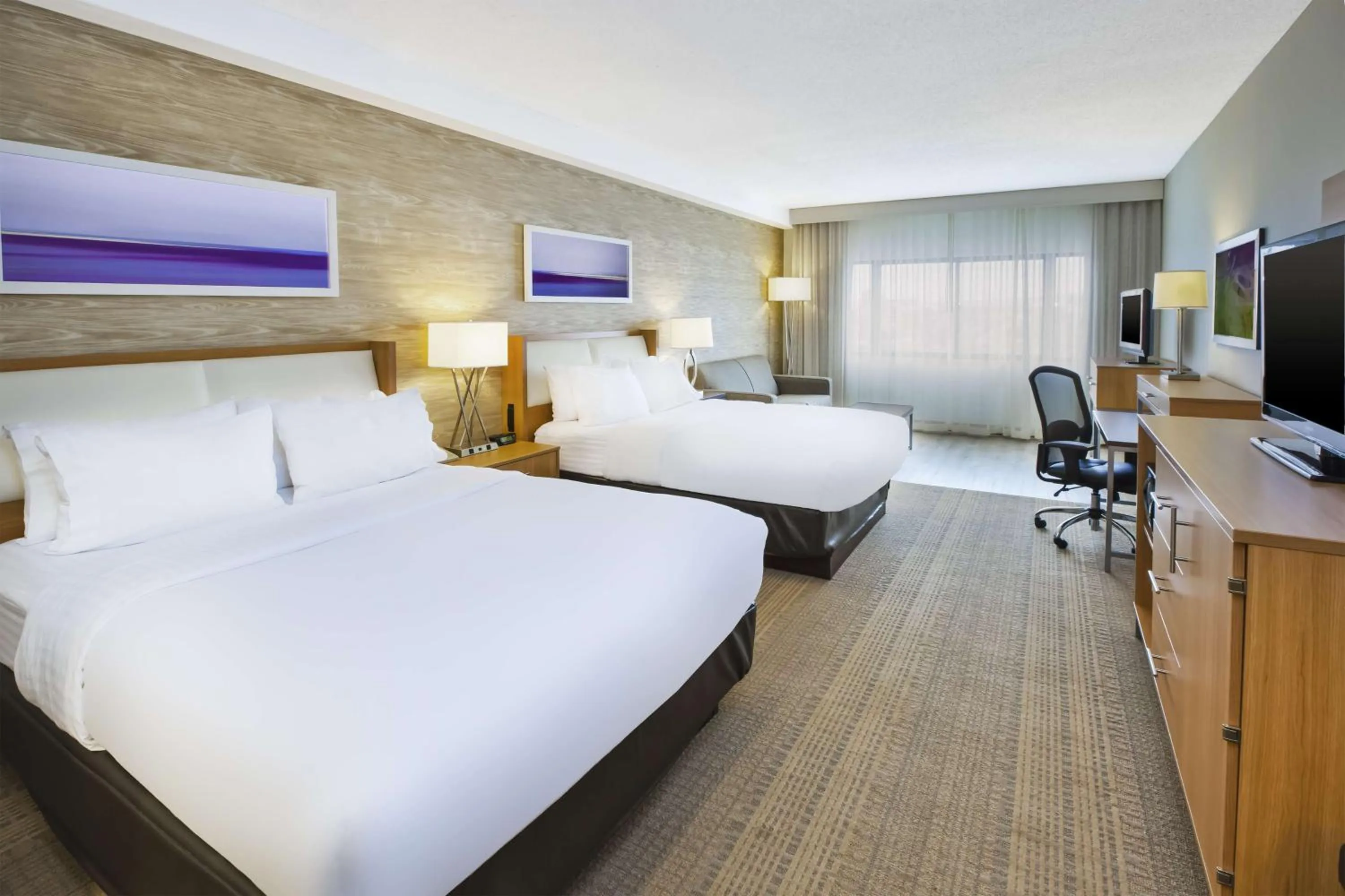 Bed in DoubleTree by Hilton Rapid City Downtown Convention Center