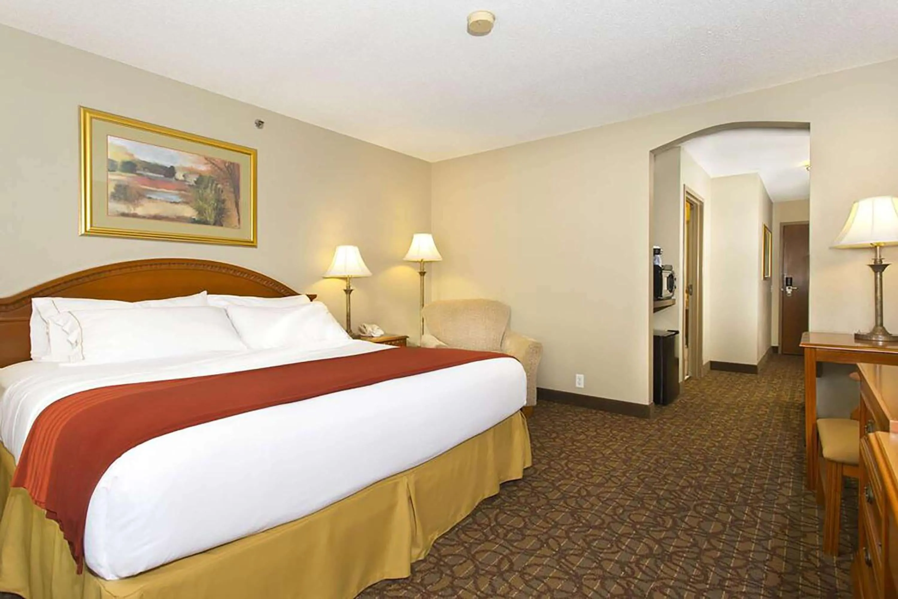 Photo of the whole room, Bed in Stay Suites formerly known as Days Inn & Suites by Wyndham La Crosse-Onalaska
