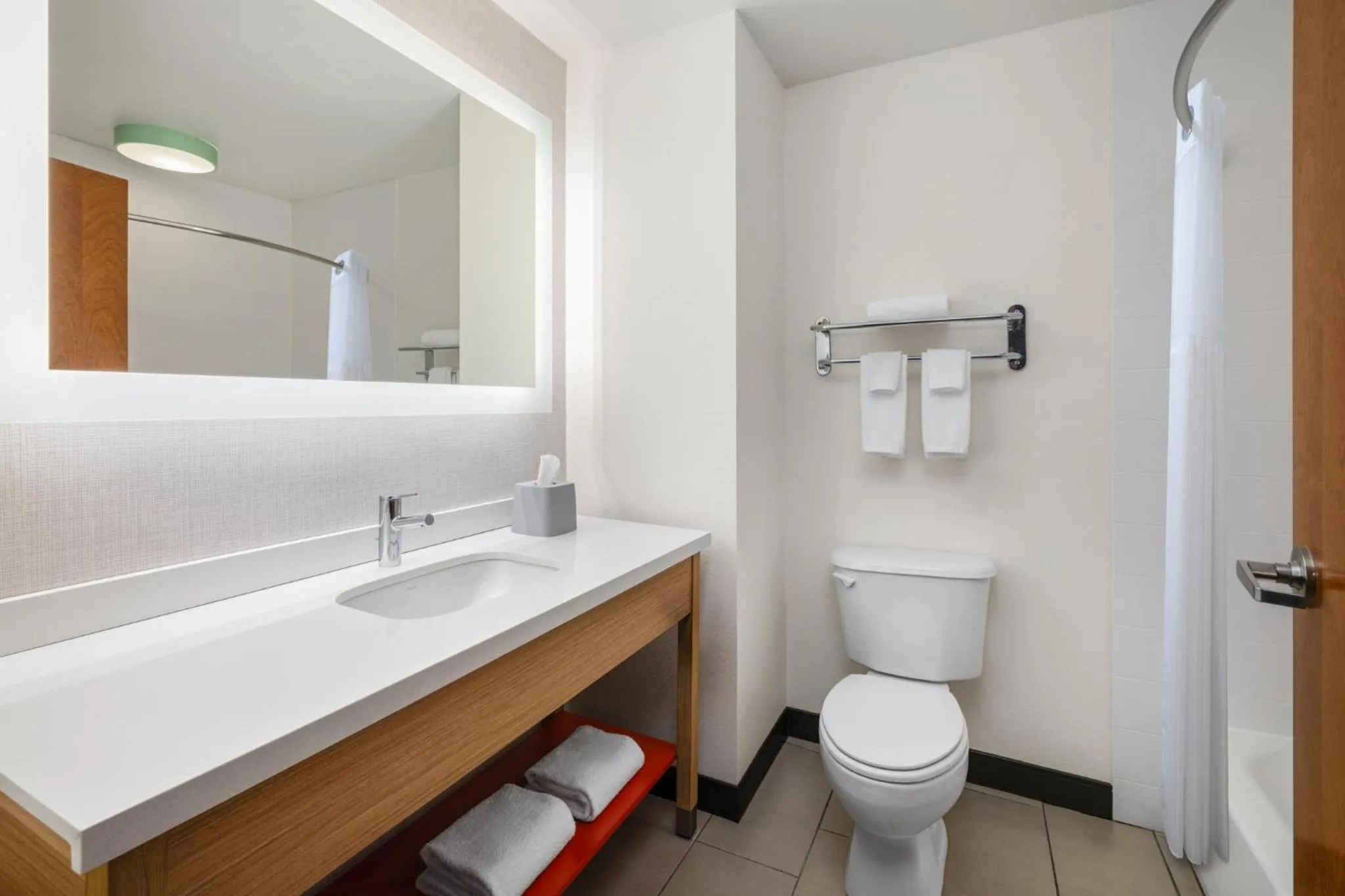 Bathroom in Garner Hotel Brookings by IHG