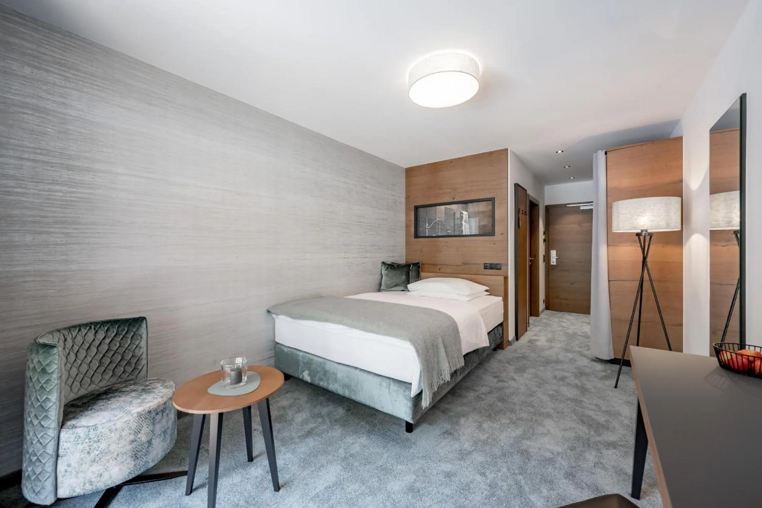 Bed in Hotel Tyrolerhof