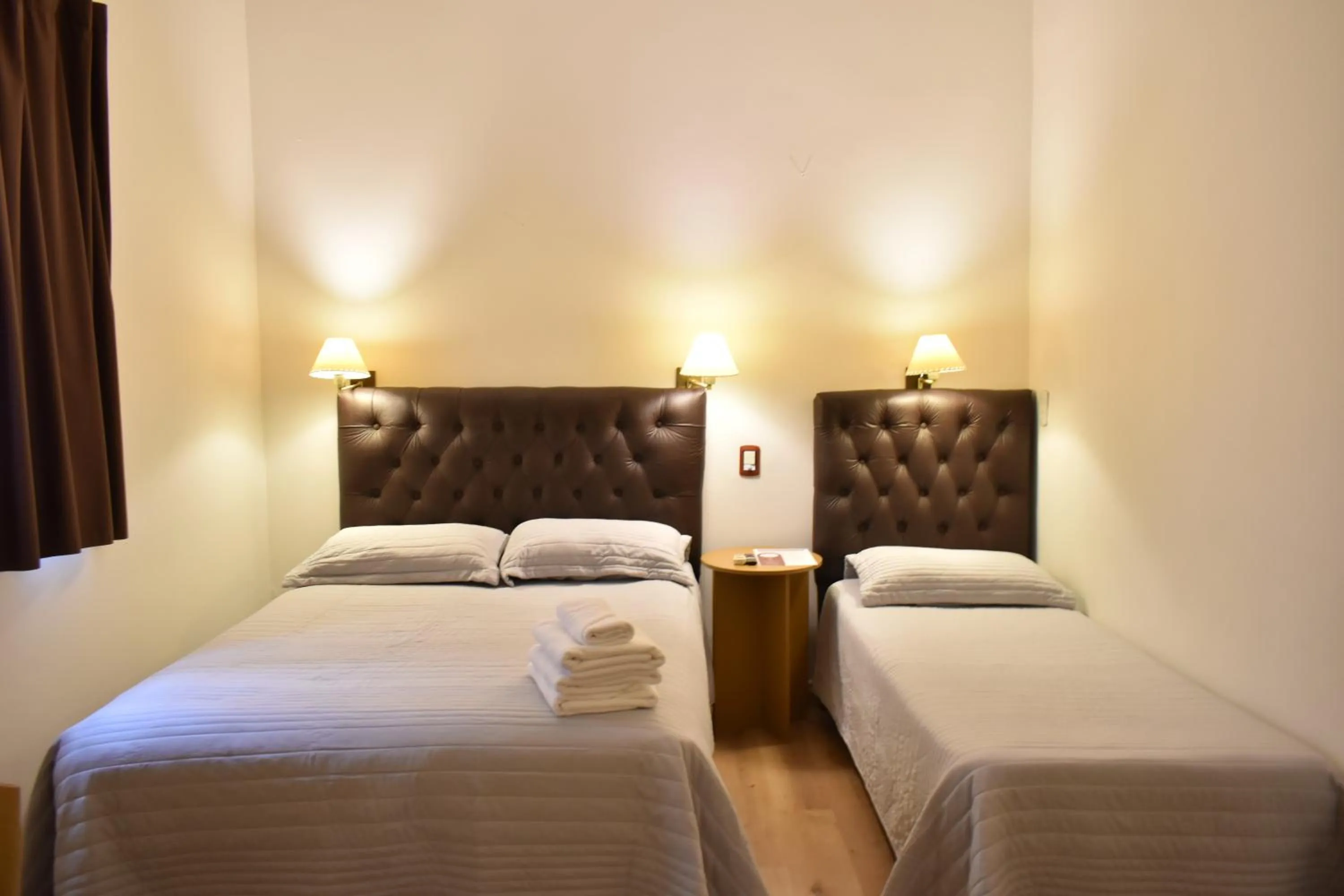 Bed in Hotel Frossard