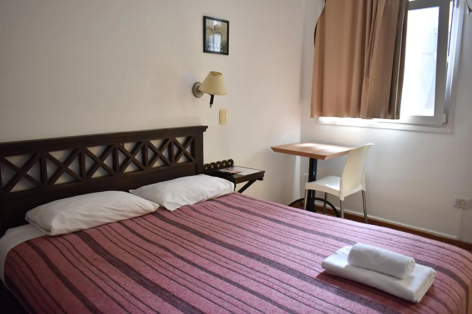 Bed in Hotel Frossard