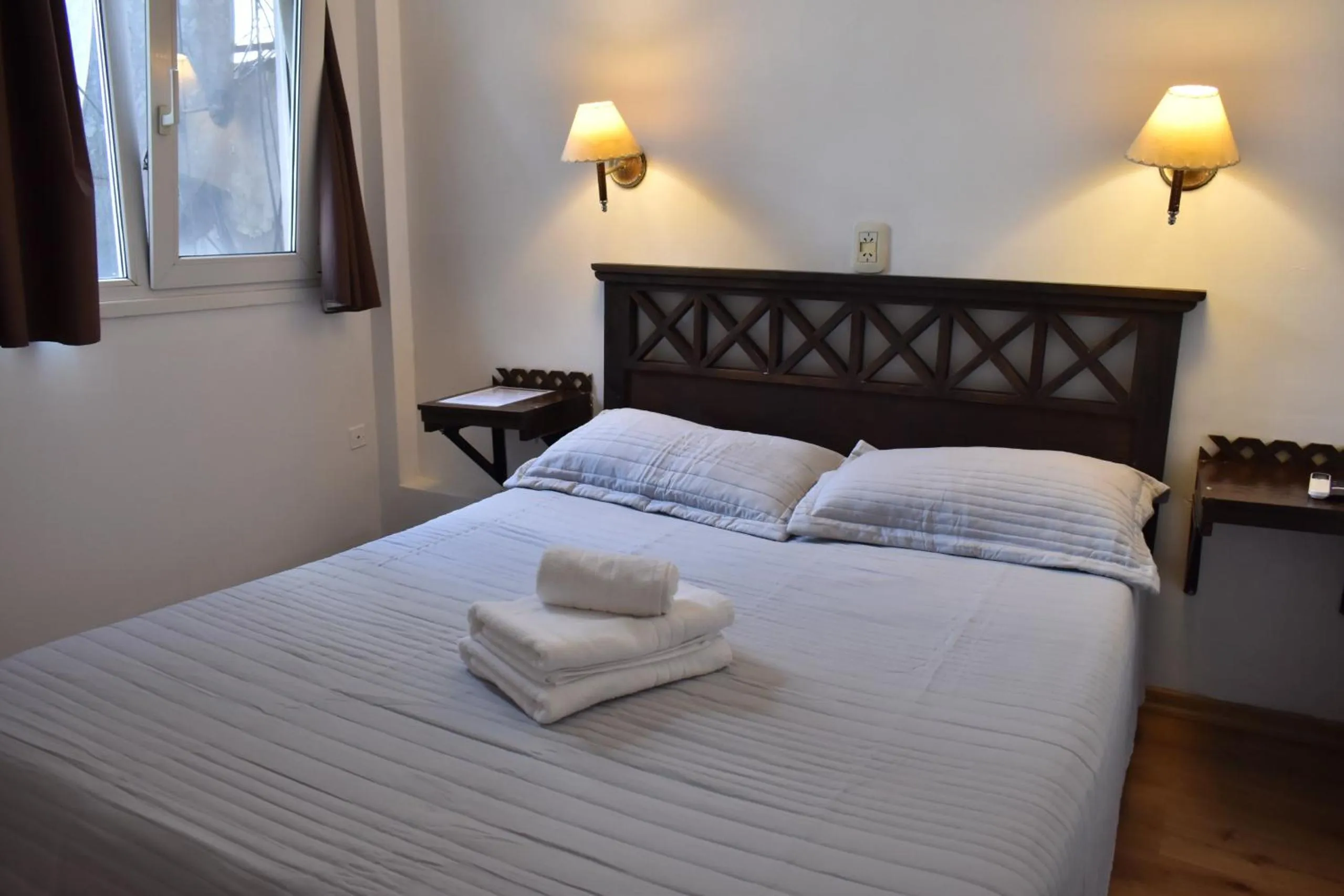 Bed in Hotel Frossard