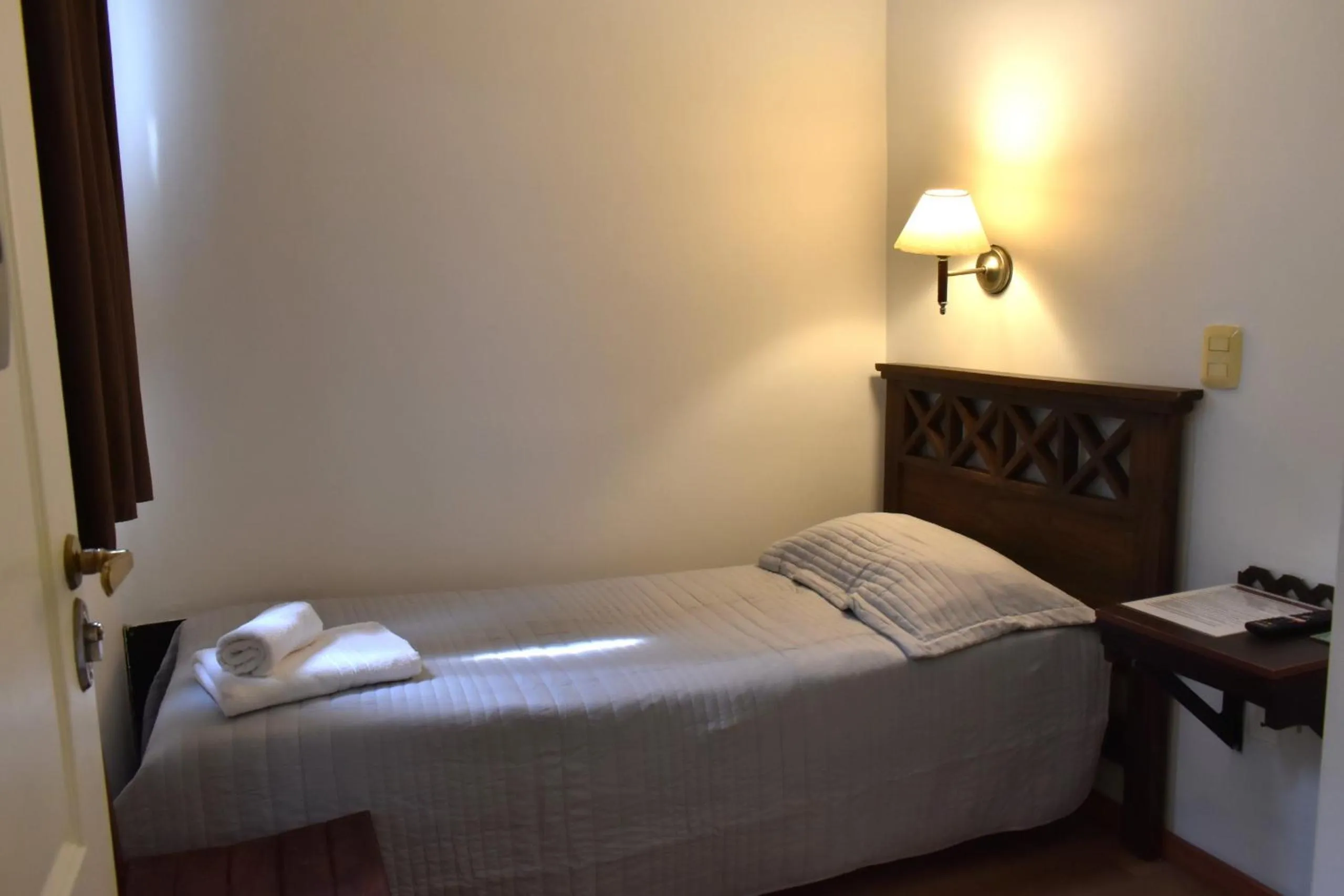 Bed in Hotel Frossard